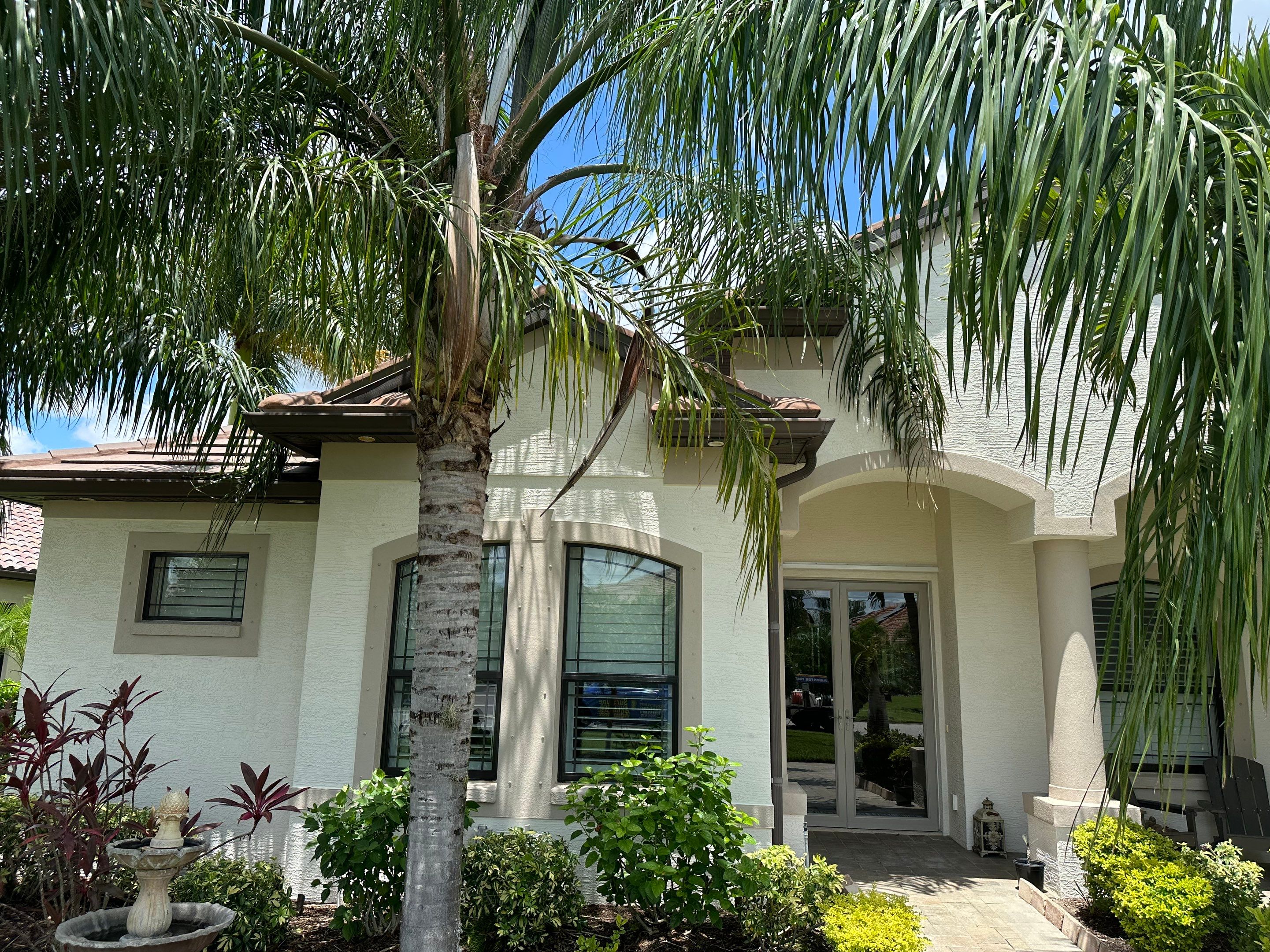 Flat Tile Roof Cleaning, House Wash & Sidewalk Cleaning in Enclave at Country Meadows, Bradenton, FL | Sunshine AquaWash by Sunshine AquaWash