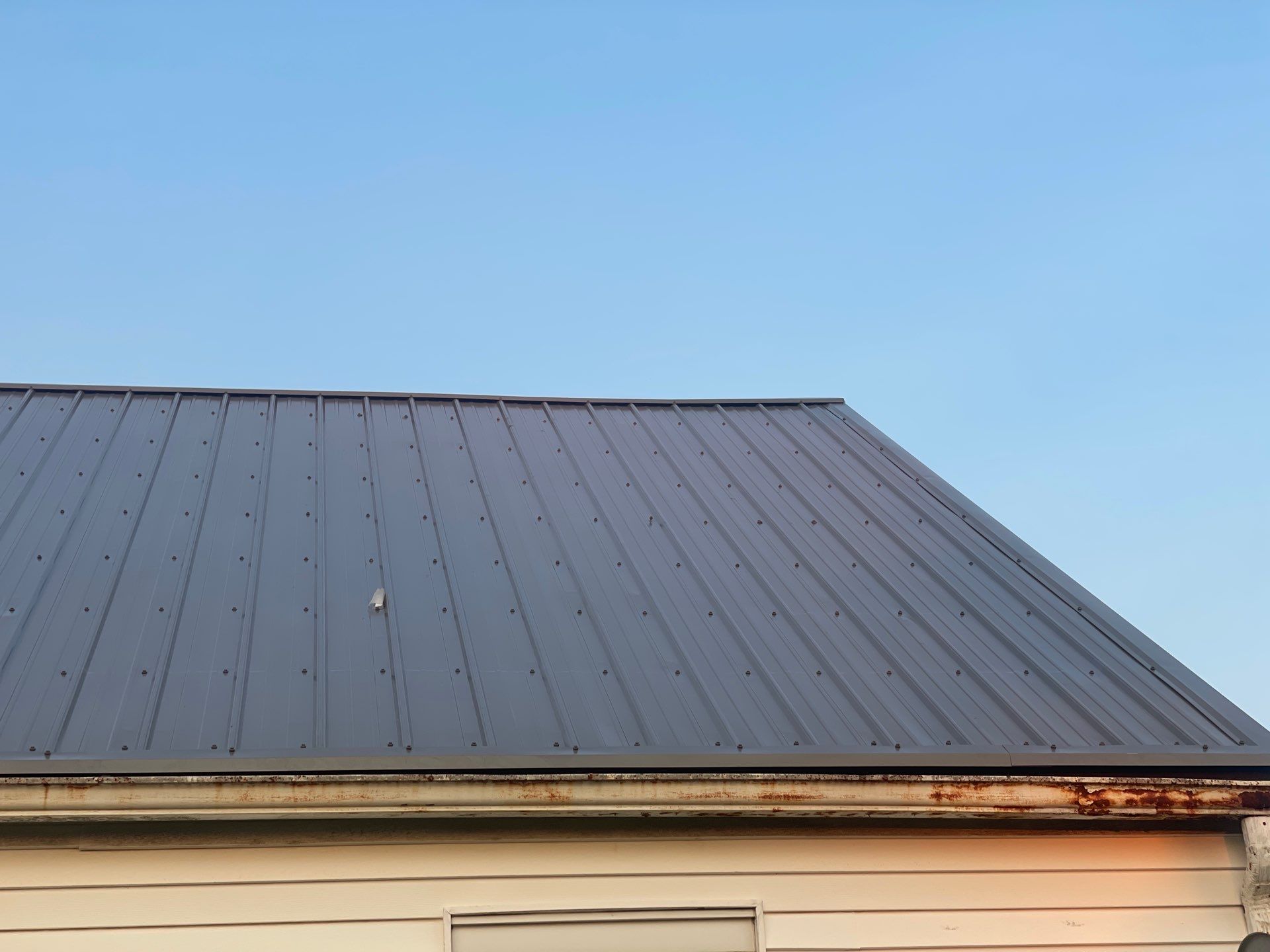 Residential Roofing Installation using Metal by Rainstoppers Roofing