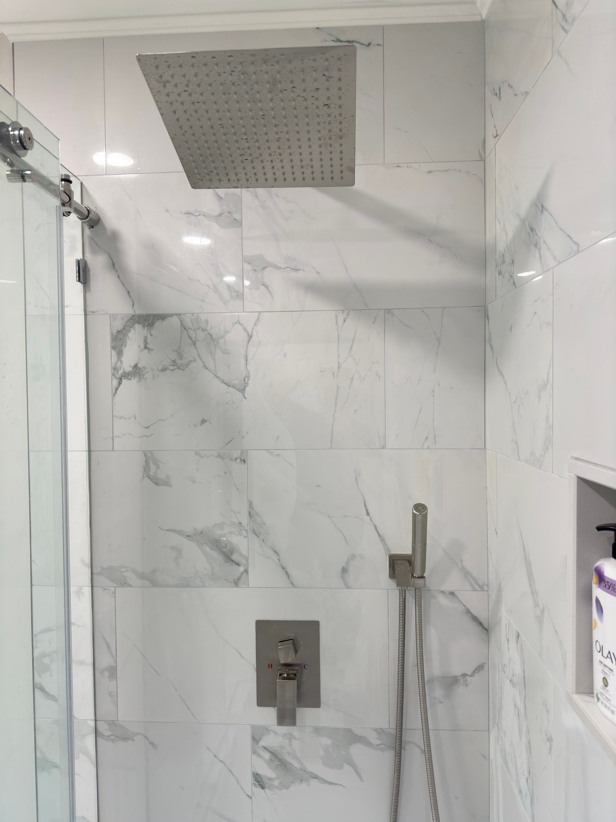 Bathroom Remodel using Tile by Home Concepts Construction