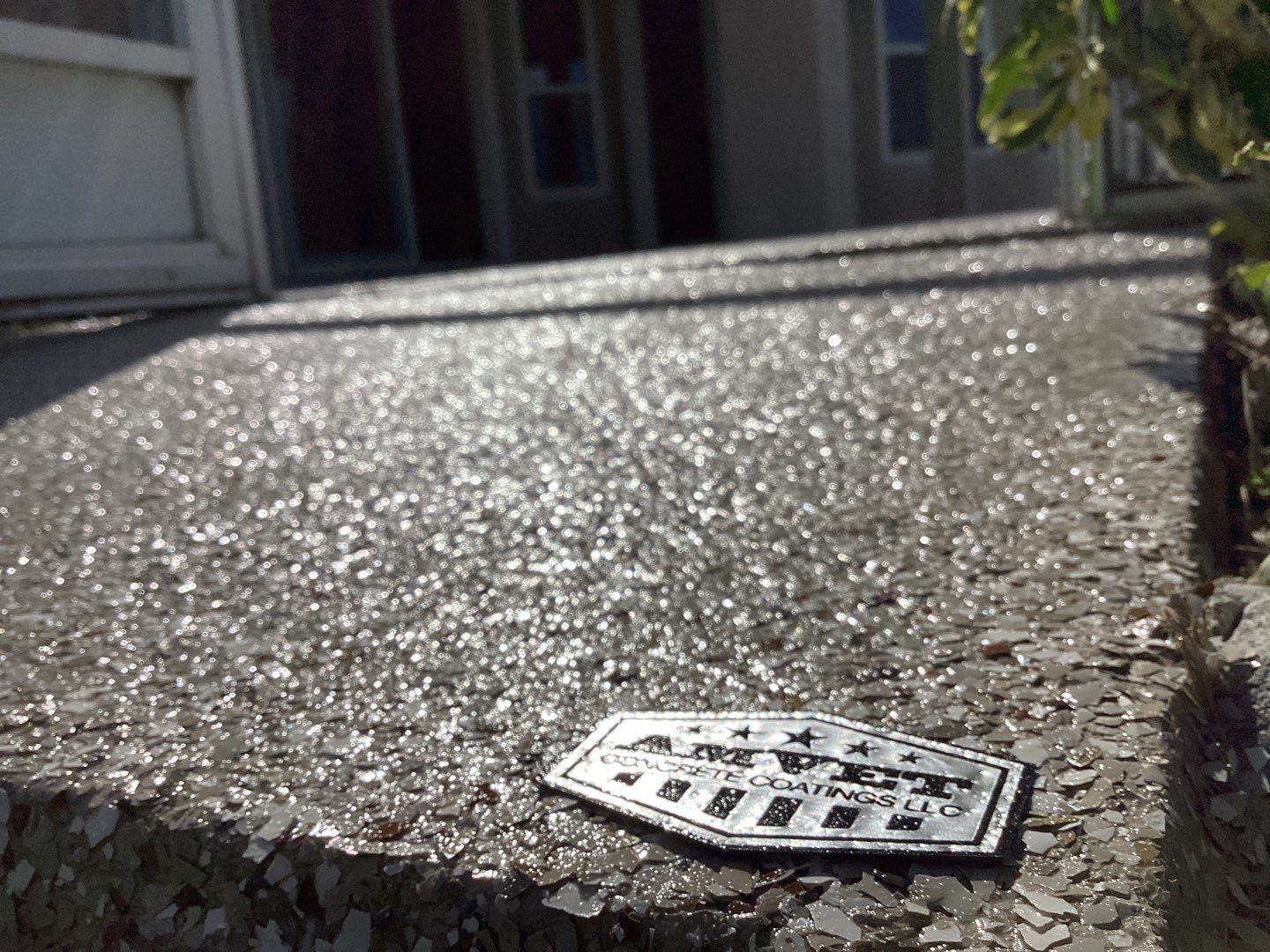 Patio using Pebble Beach by Amvet concrete coatings llc
