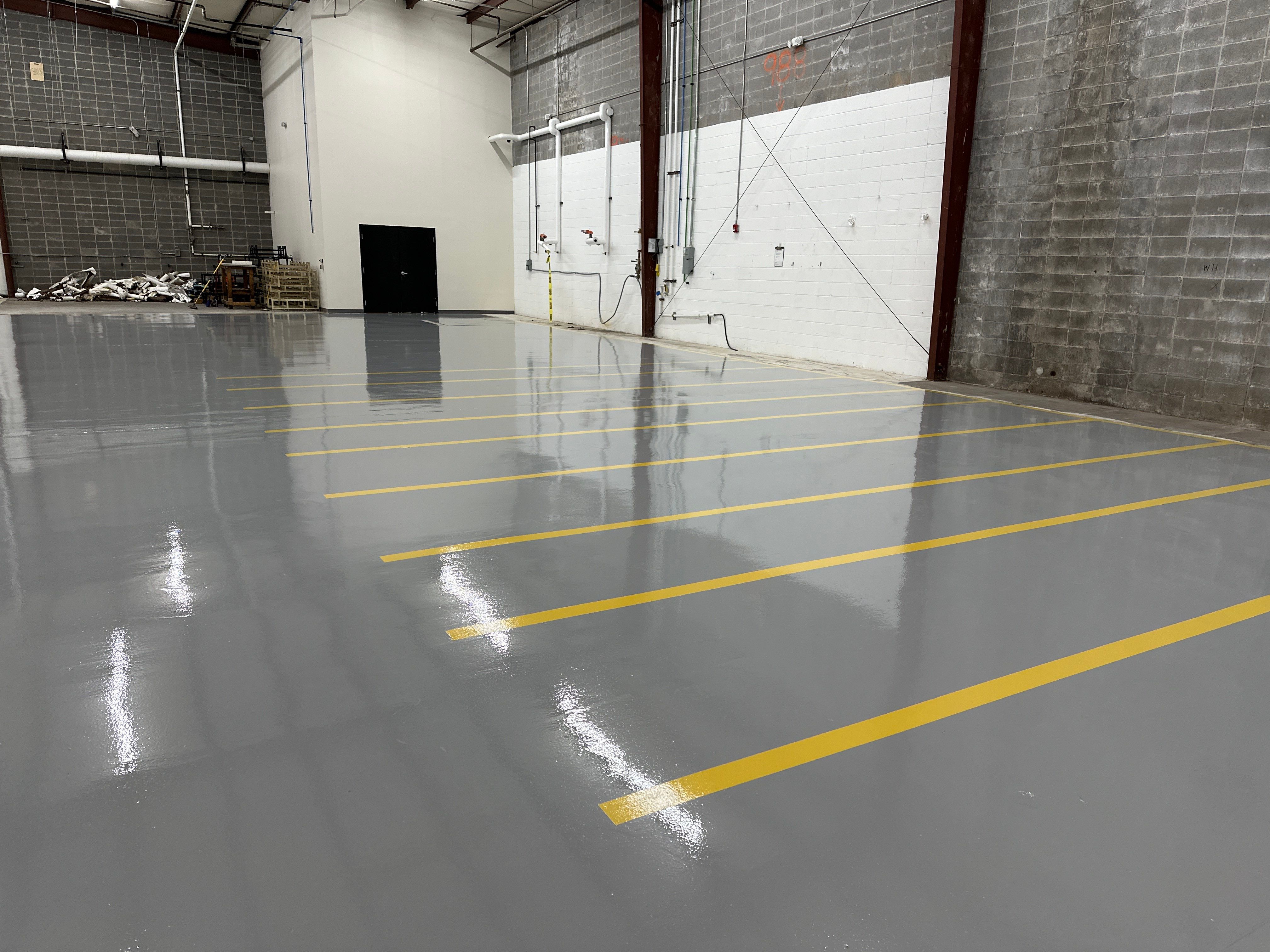 High-Gloss Industrial Epoxy Flooring Installation in Tucker, Georgia by Cornerstone Hard Surface Restoration
