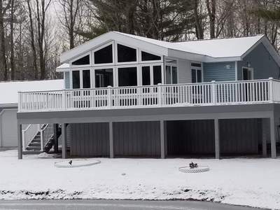 Sunroom and deck addition.