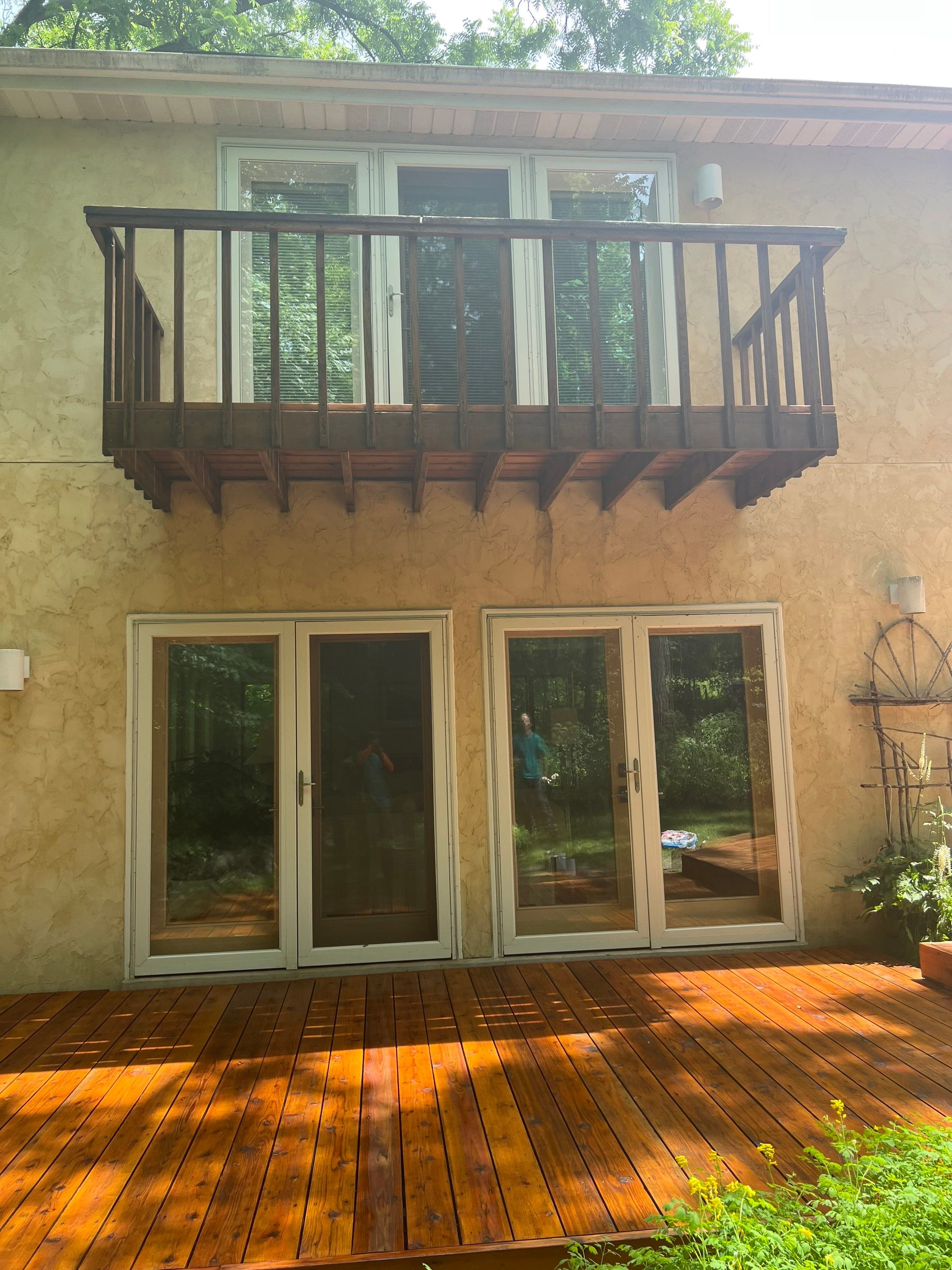 Multi-Level Wood Deck Restoration and Refinishing in Muskego by OCS Contracting Services