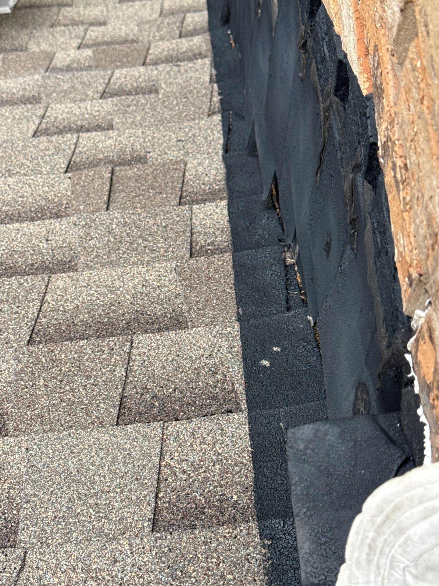 Cricket and Flashing Repair  by Rhino Roofing and General Contracting, LLC
