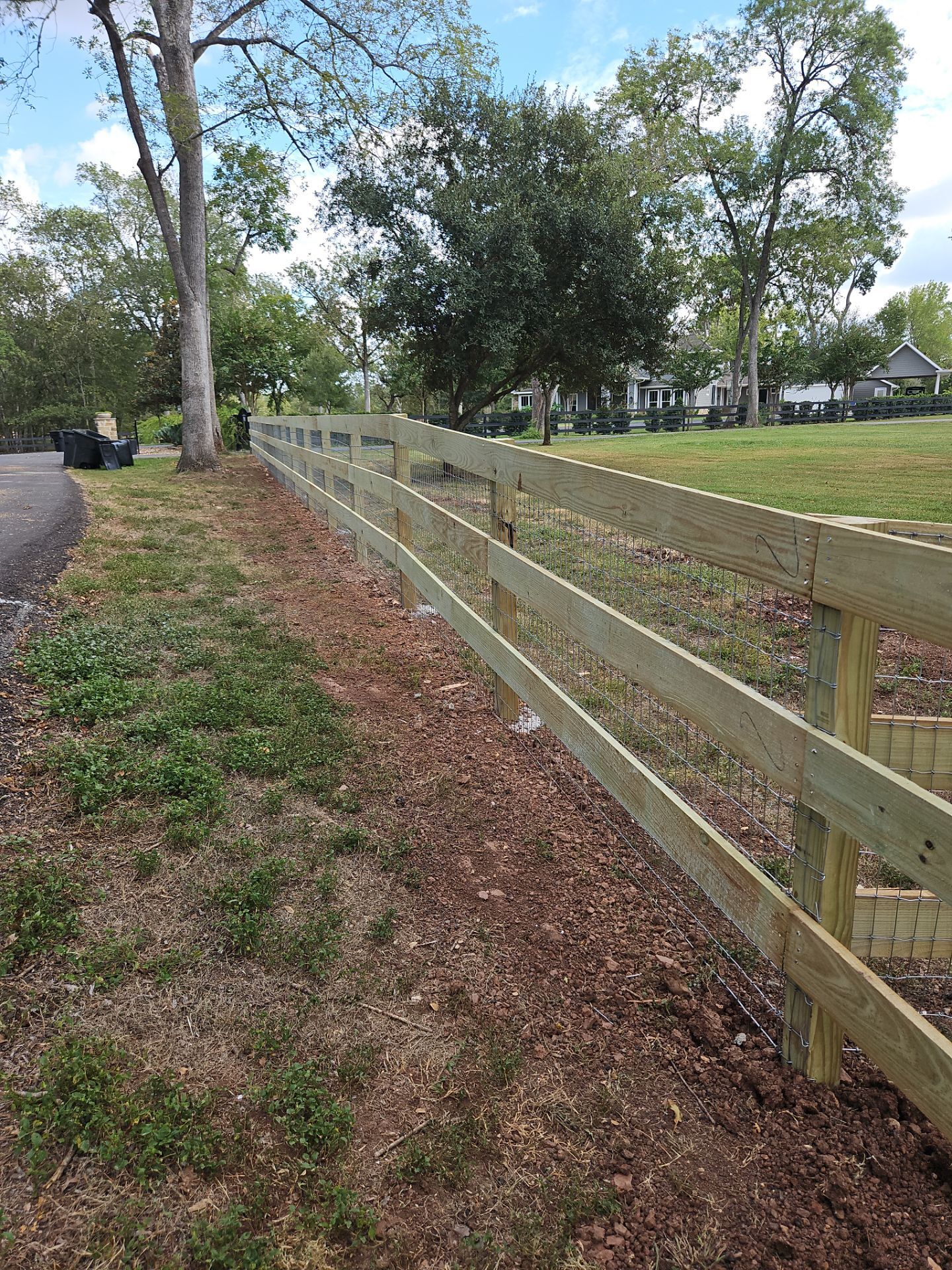 Ranch Style fence Plus Iron installation by Tim's Fences