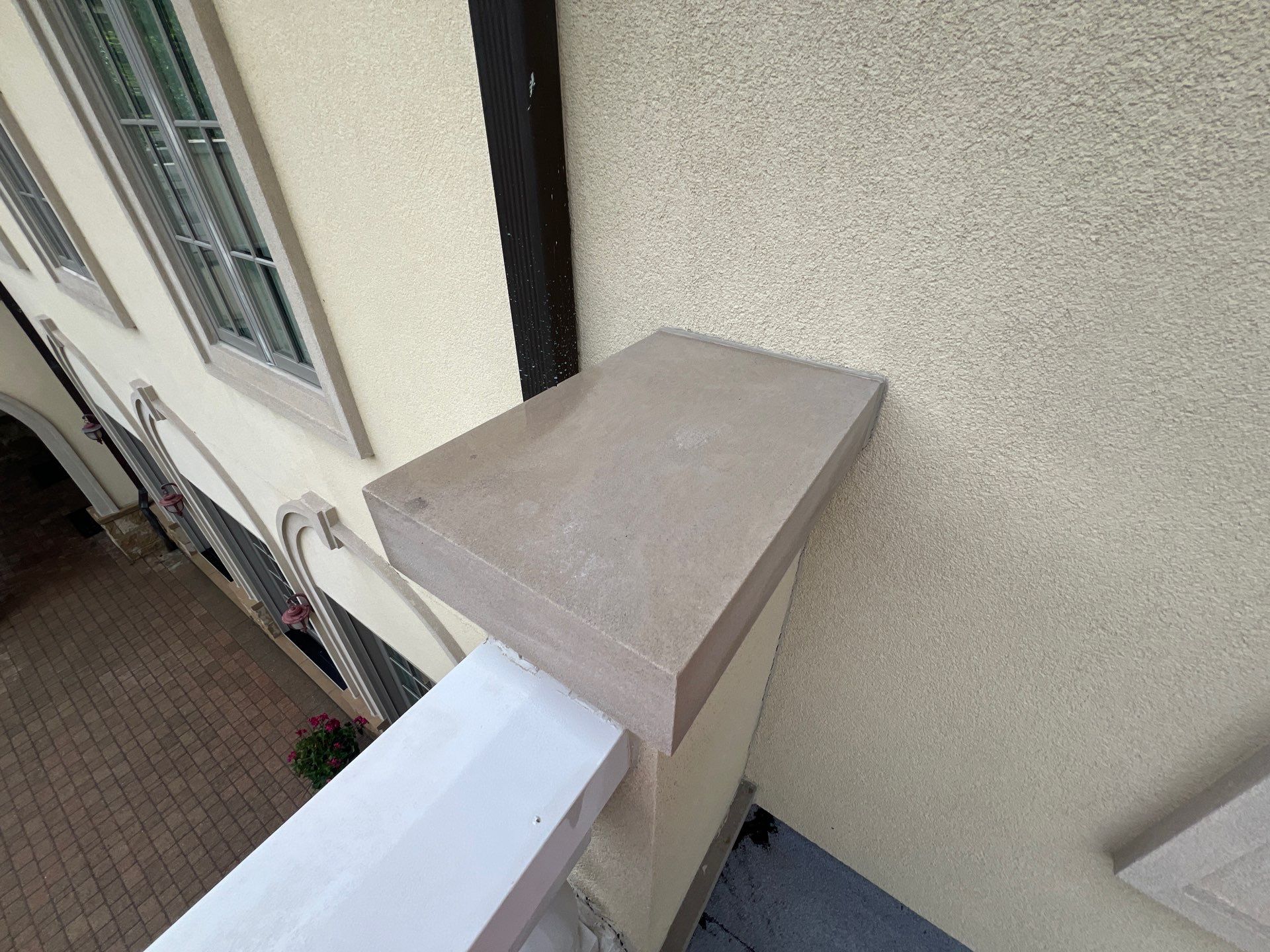 concrete cleaning using Algaecide, soft wash soap by Northern Power Washing LLC.