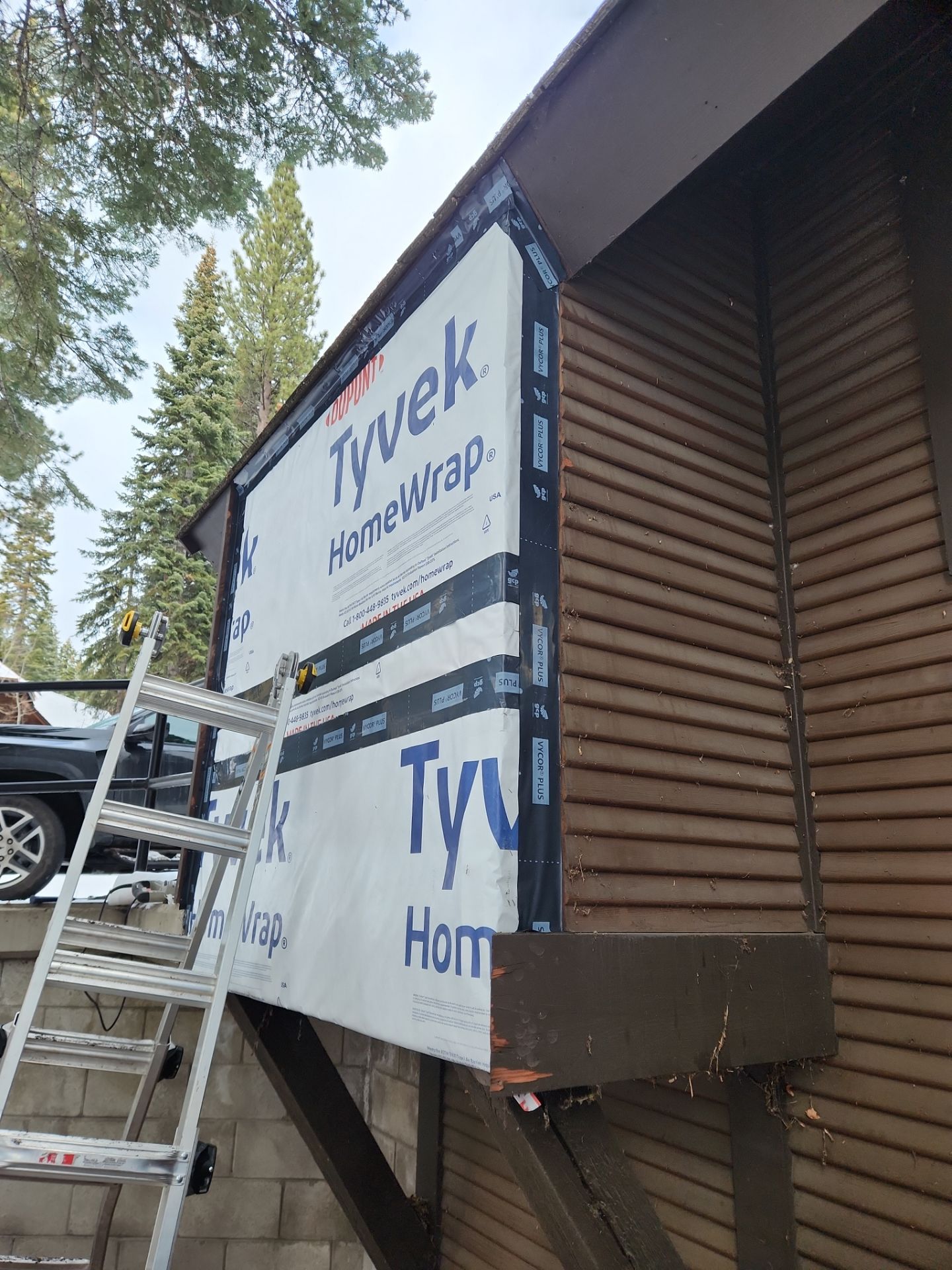 Kitchen Lighting/Siding Repair by The Tahoe Tradesman