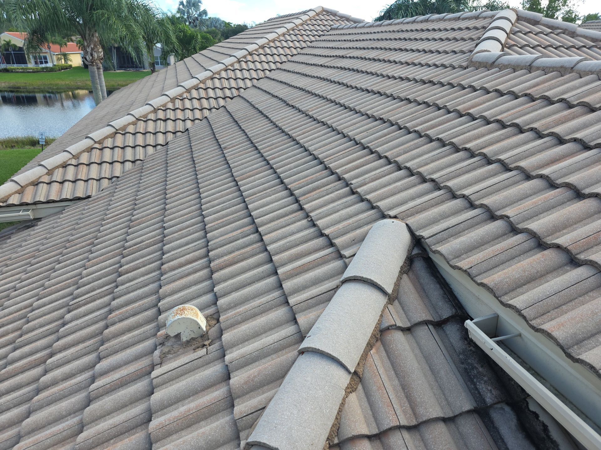 Full Concrete S-Tile Roof Replacement and Deck Repair in Wellington by Aastro Roofing