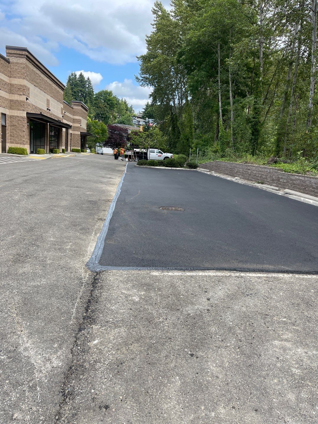 Asphalt Patch Repair & Concrete Curb Renovation | Kirkland  by Jireh Asphalt & Concrete Inc 