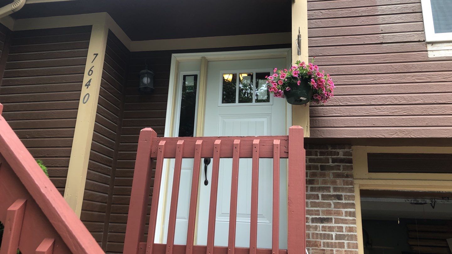 Siding Installation using Heartland Patio Door by EEC  Windows, Siding & Roofing 