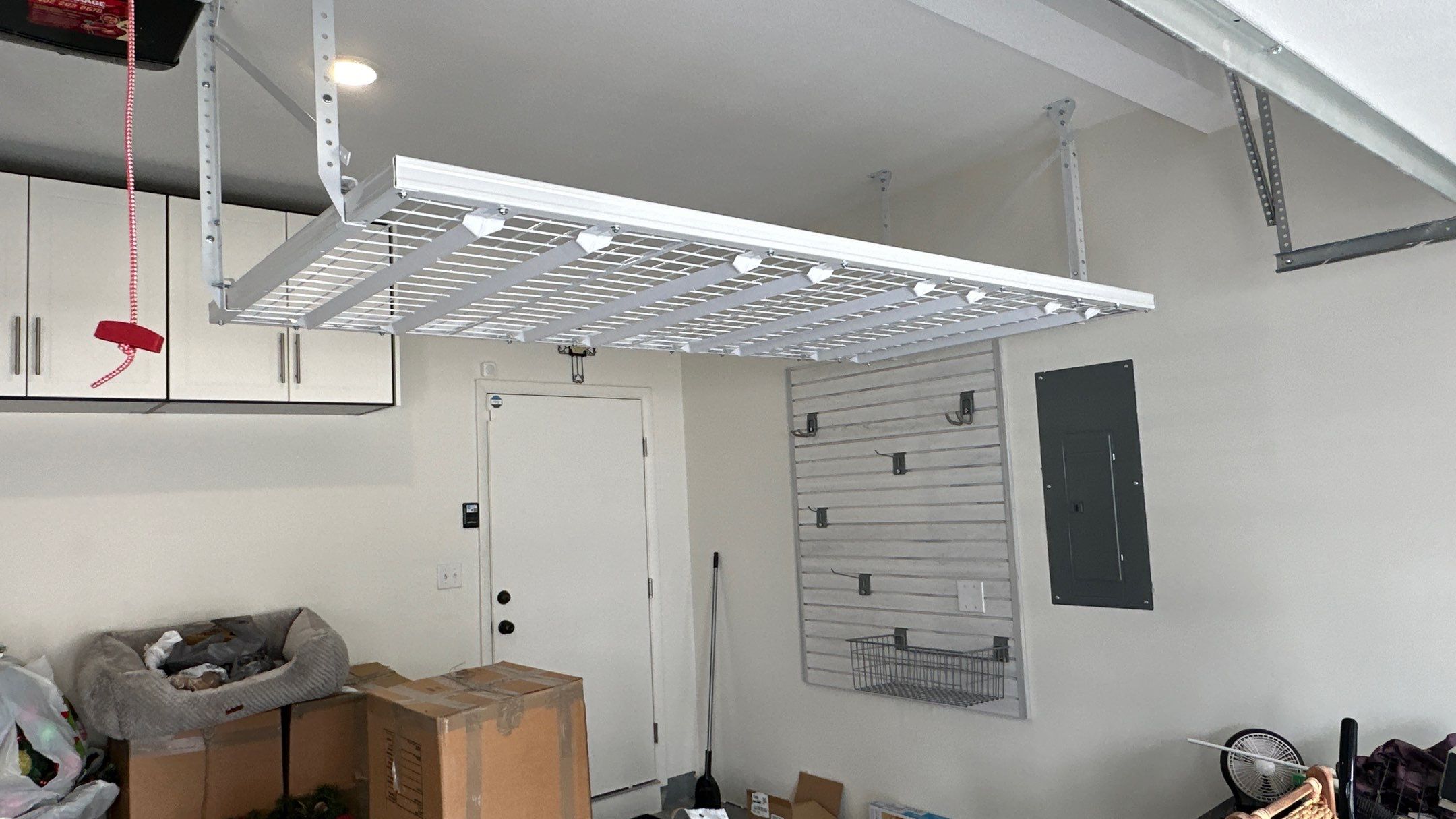 Michael M. upgraded his garage with overhead racks and slotwall by Banner Garage