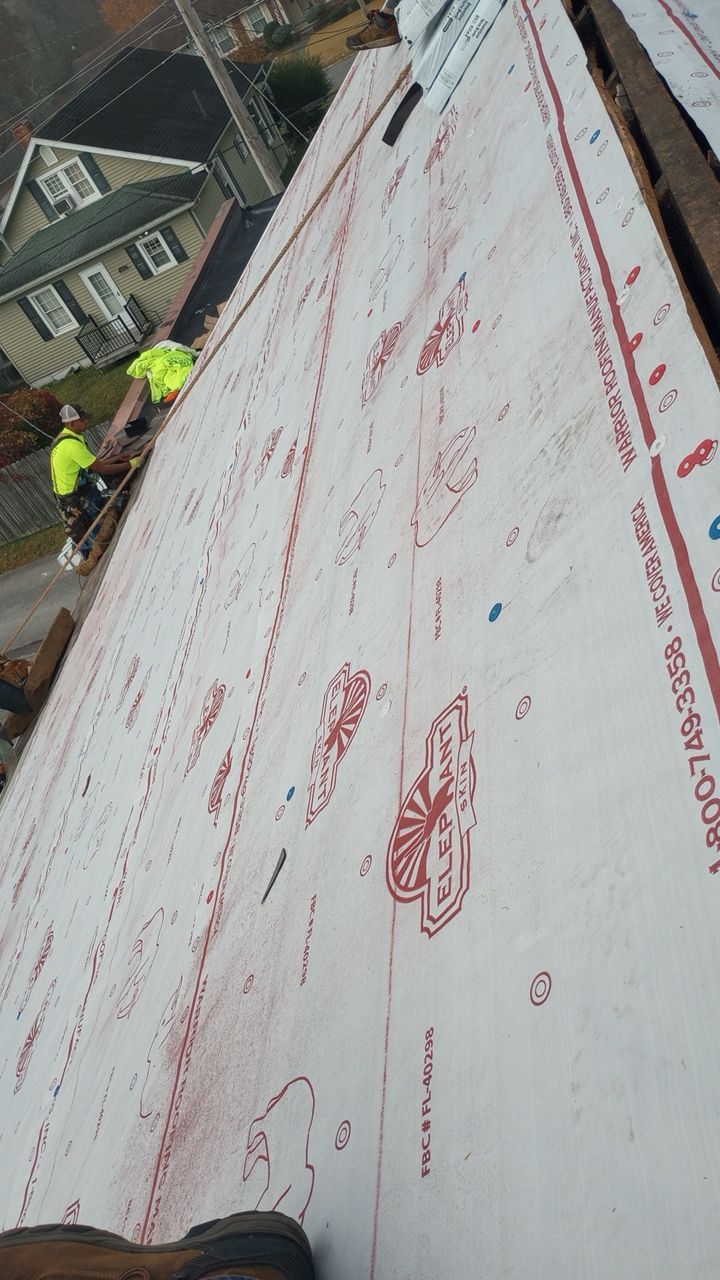 Commercial Roofing Installation using Performance Shingles by Mr. Roofer