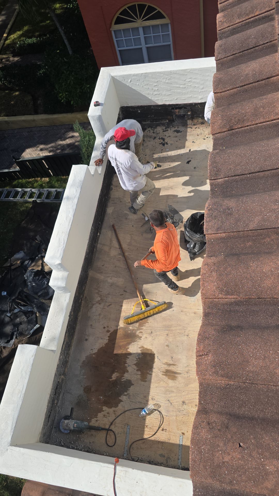 West Palm Beach Roof Restoration and Travertine Paver Driveway Installation by Aastro Roofing