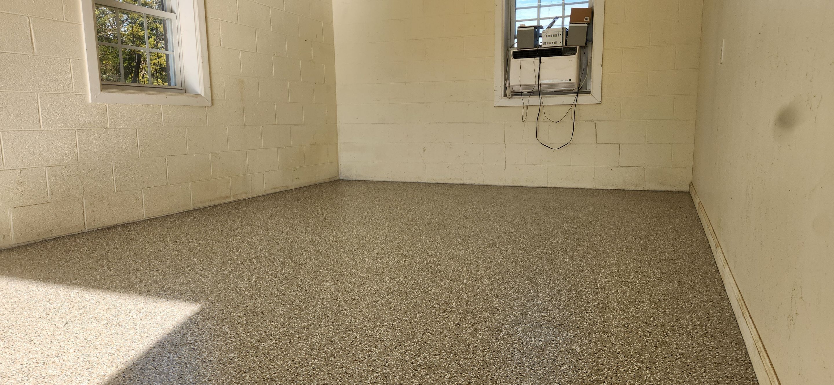 Porch & Garage Using Rocky Ridge & Creekbed by Elite Floor Solutions