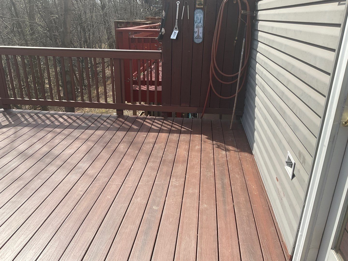 Deck Installation using New Composite Deck Board by Alpha Design Services