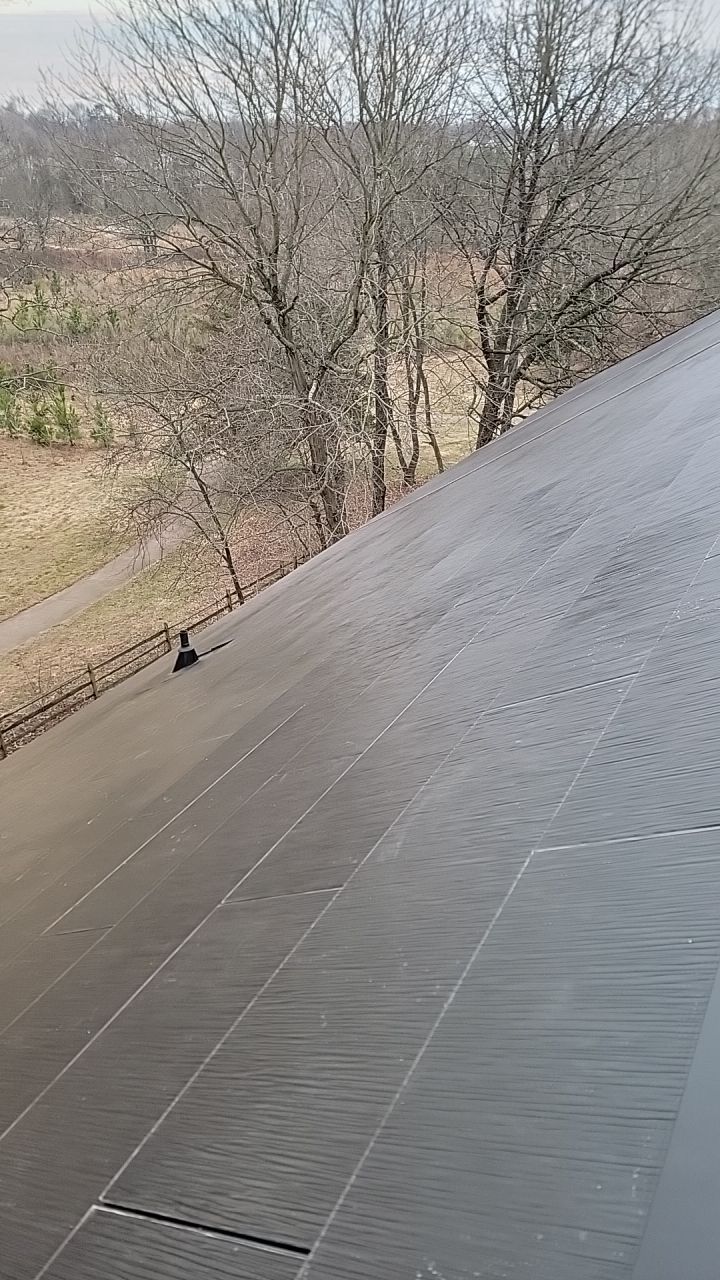 Tesla Solar Roof on New Construction by American Home Contractors