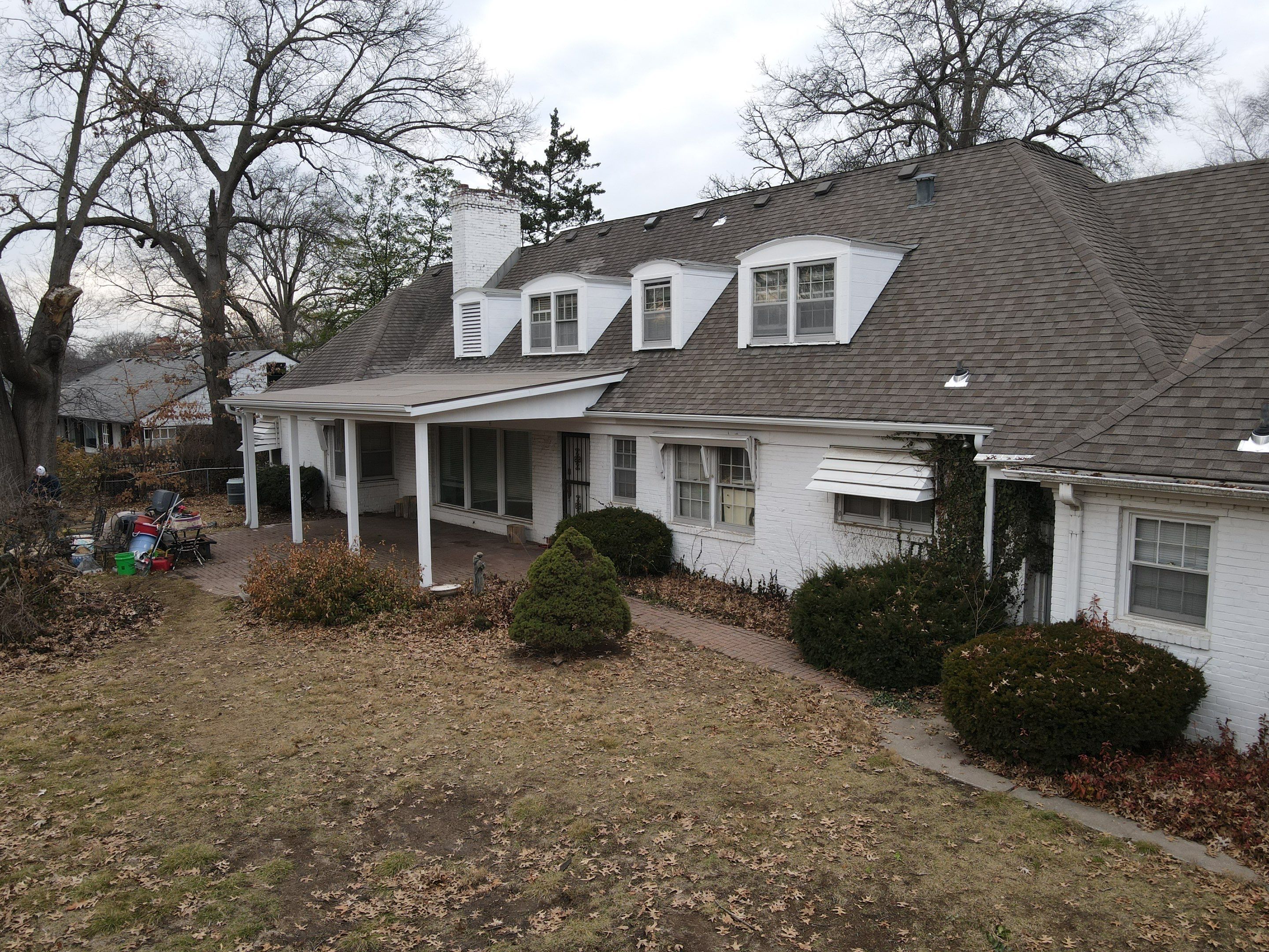 Roof Repair/Awning Rebuild from Tree Damage by Summit Roofing