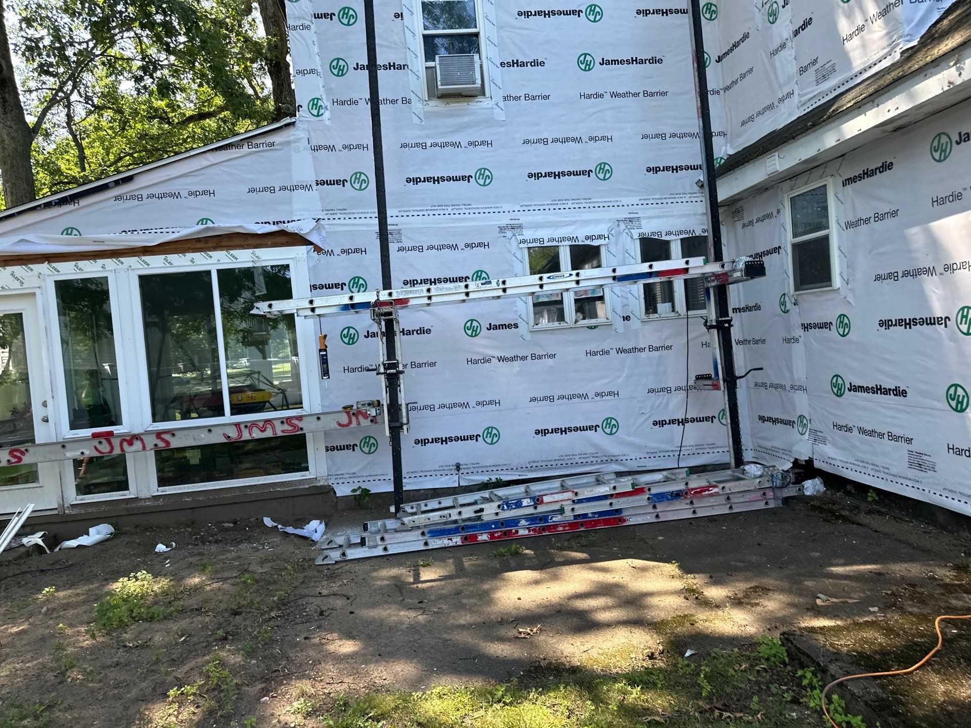 James Hardie Lap Siding Installation in Chelmsford, MA by Mighty Dog Roofing of Greater Middlesex County