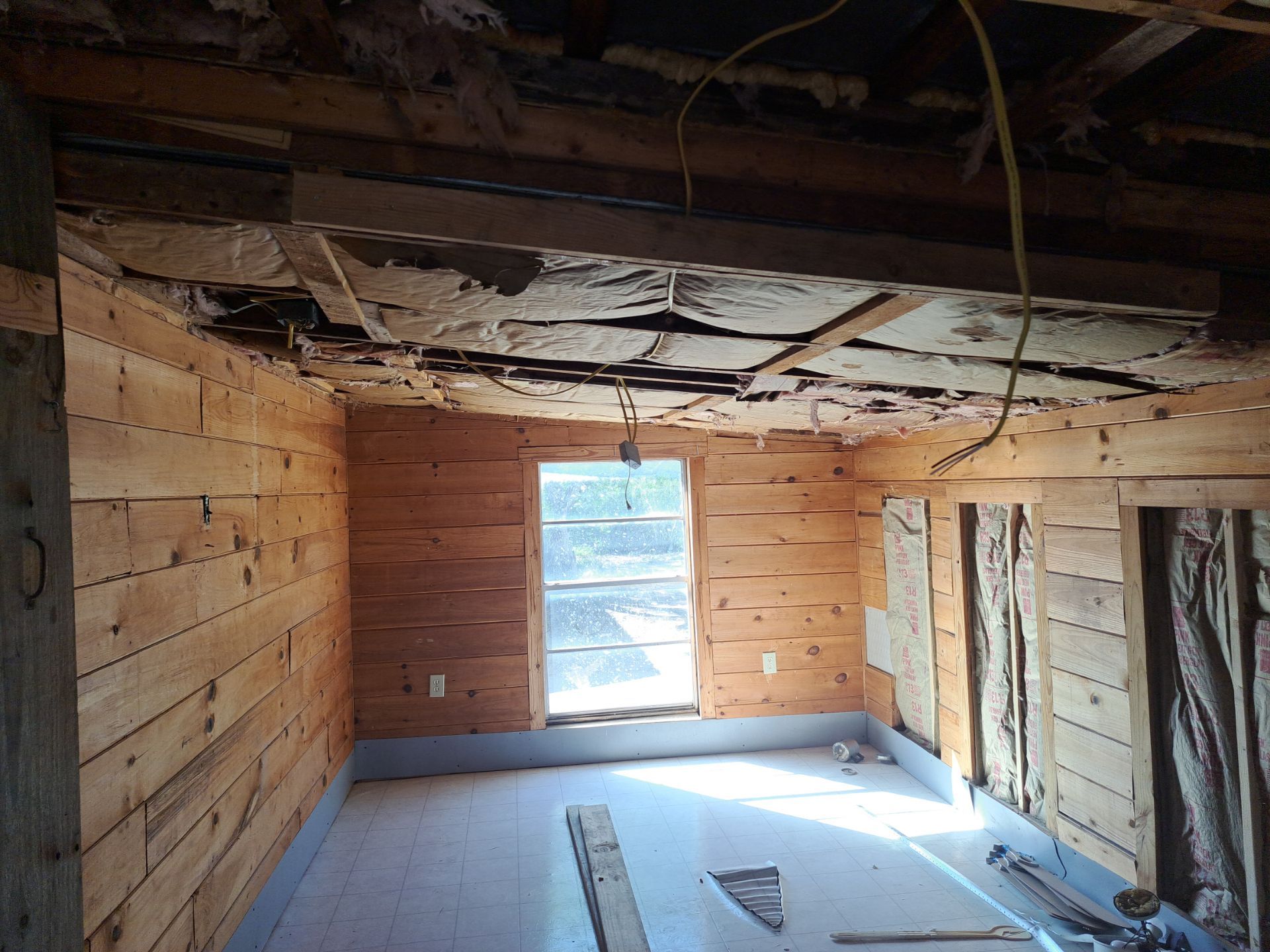 Paneling to Sheetrock Conversion by Very Good Construction Company