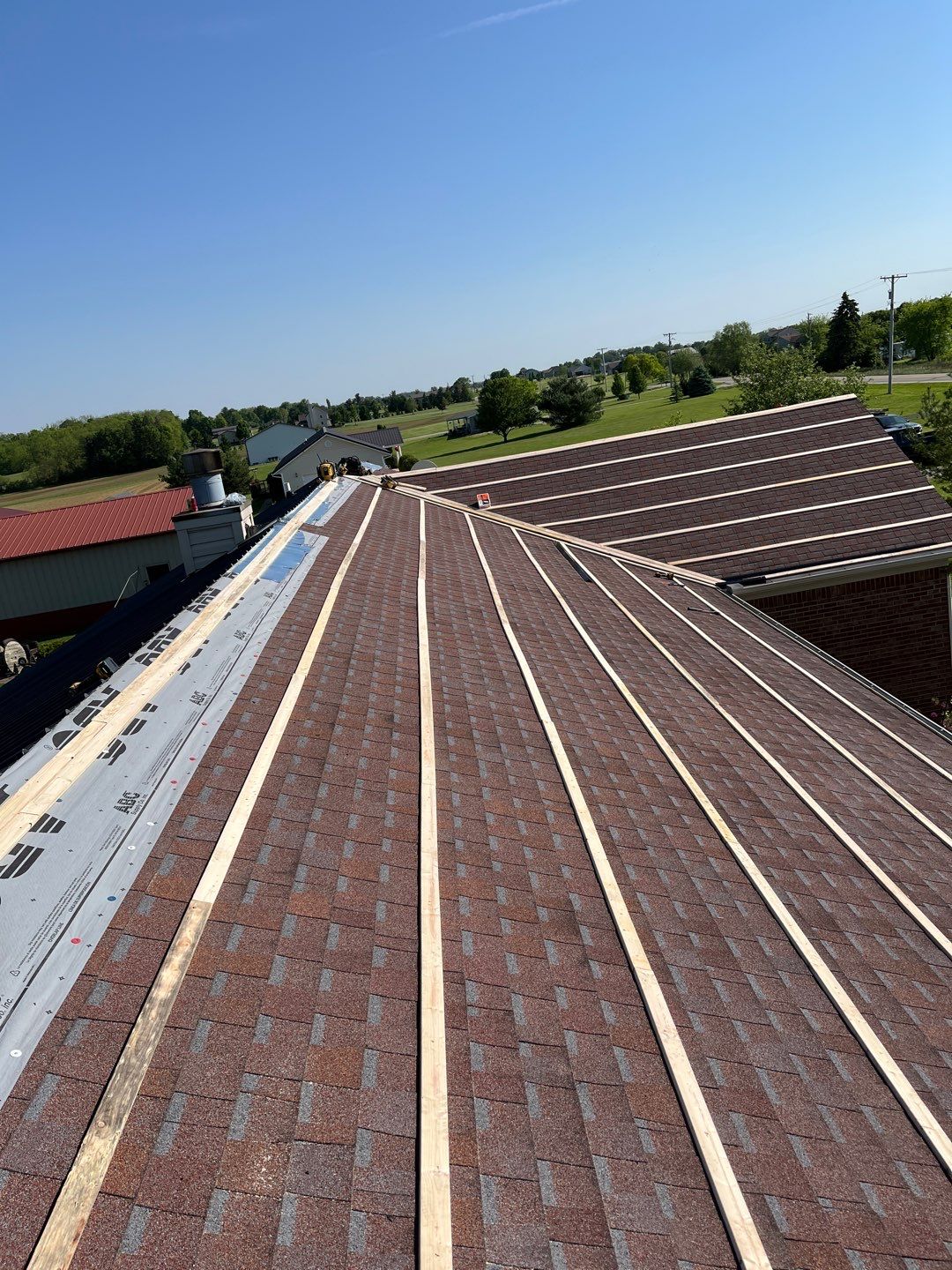 Residential Roofing Installation using Perfromance Panel Metal - Black by RoofX 