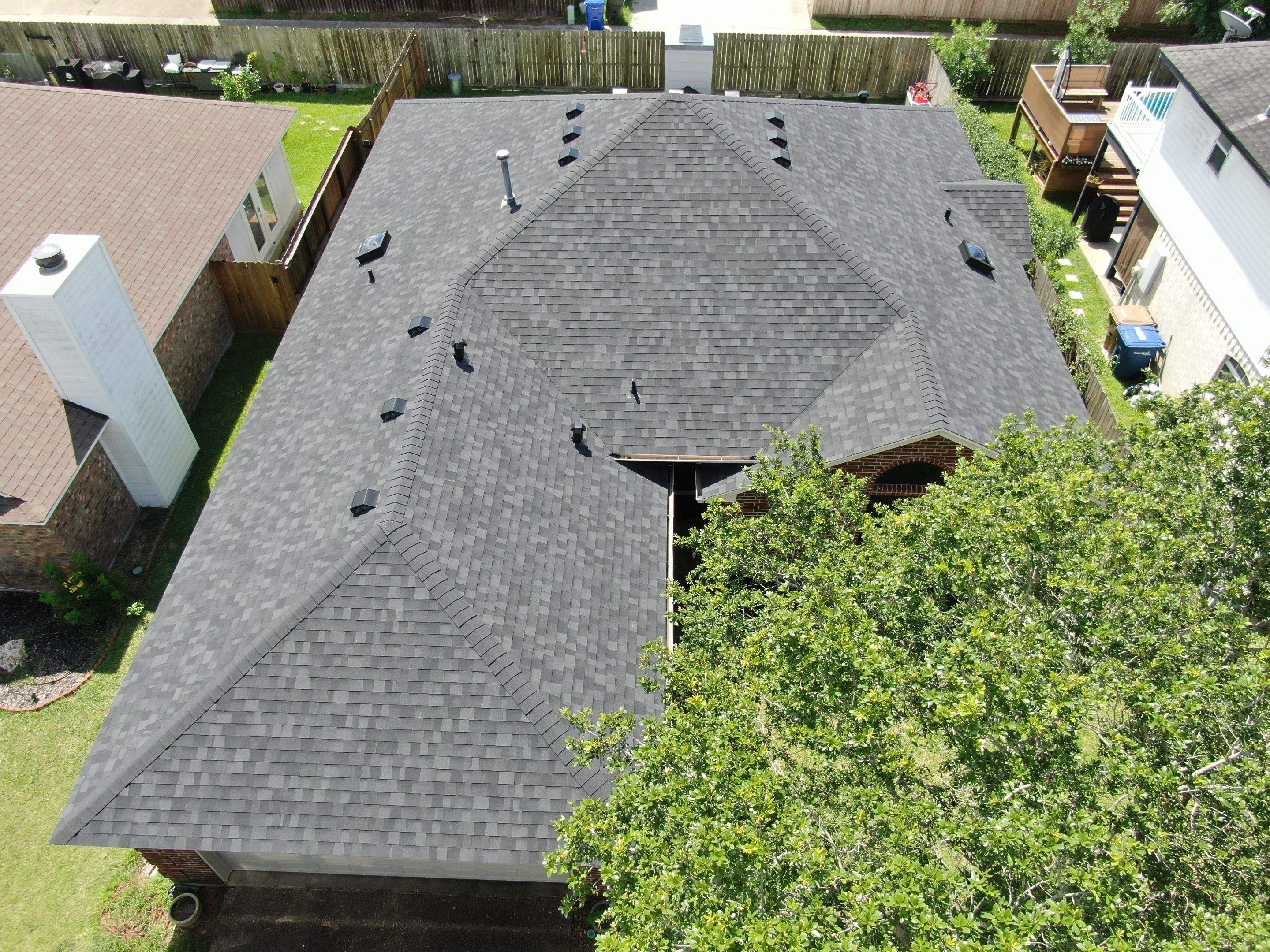 Nothing looks nicer than a little black roof by Bayfront Roofing and Construction