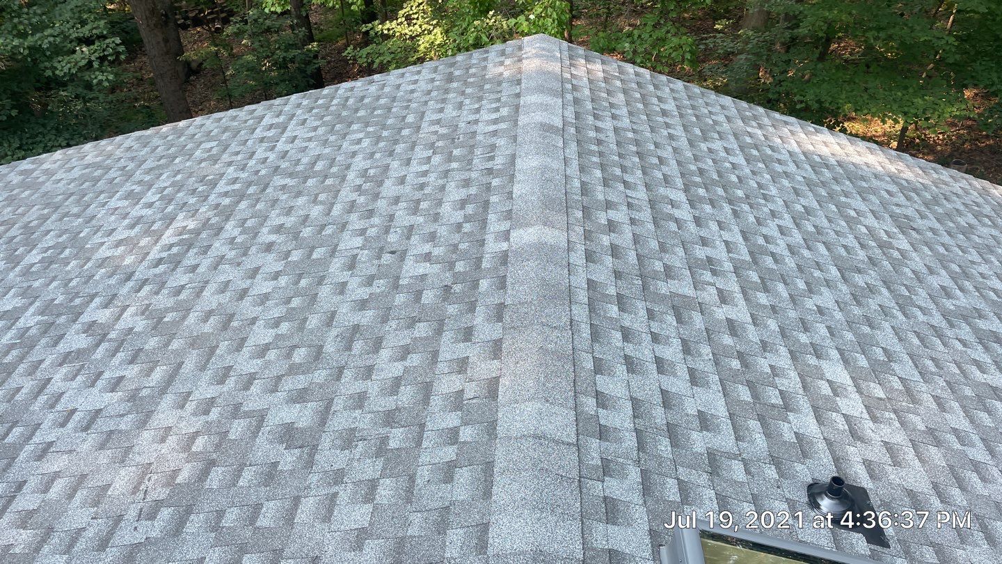 Deckhouse Roof Replacement by American Home Contractors