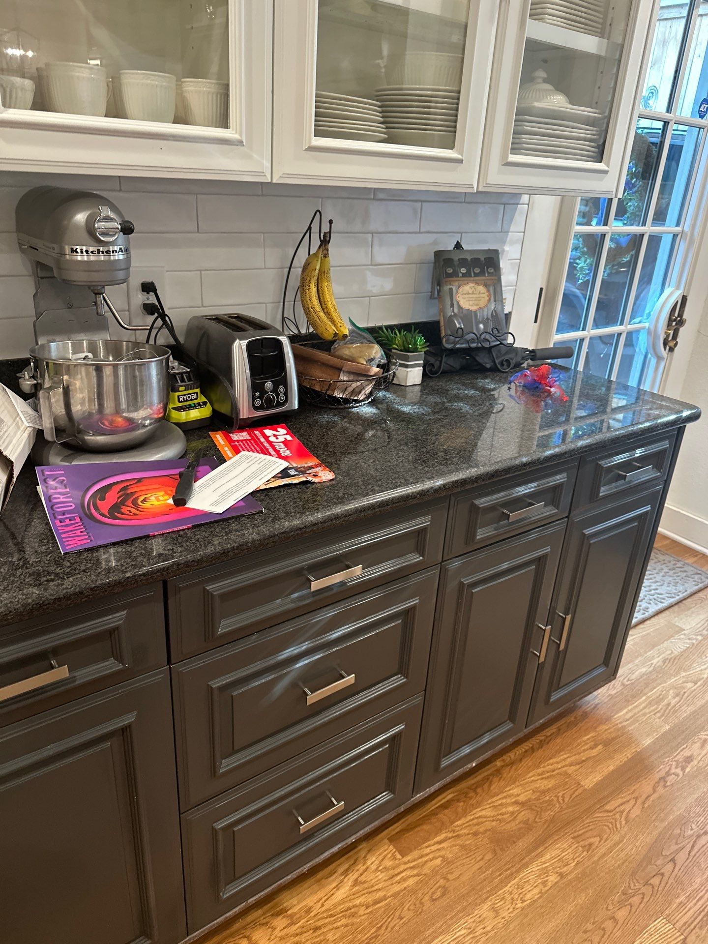 Kitchen countertops using Mysterio Gold Vicostone by Mena stone surfaces