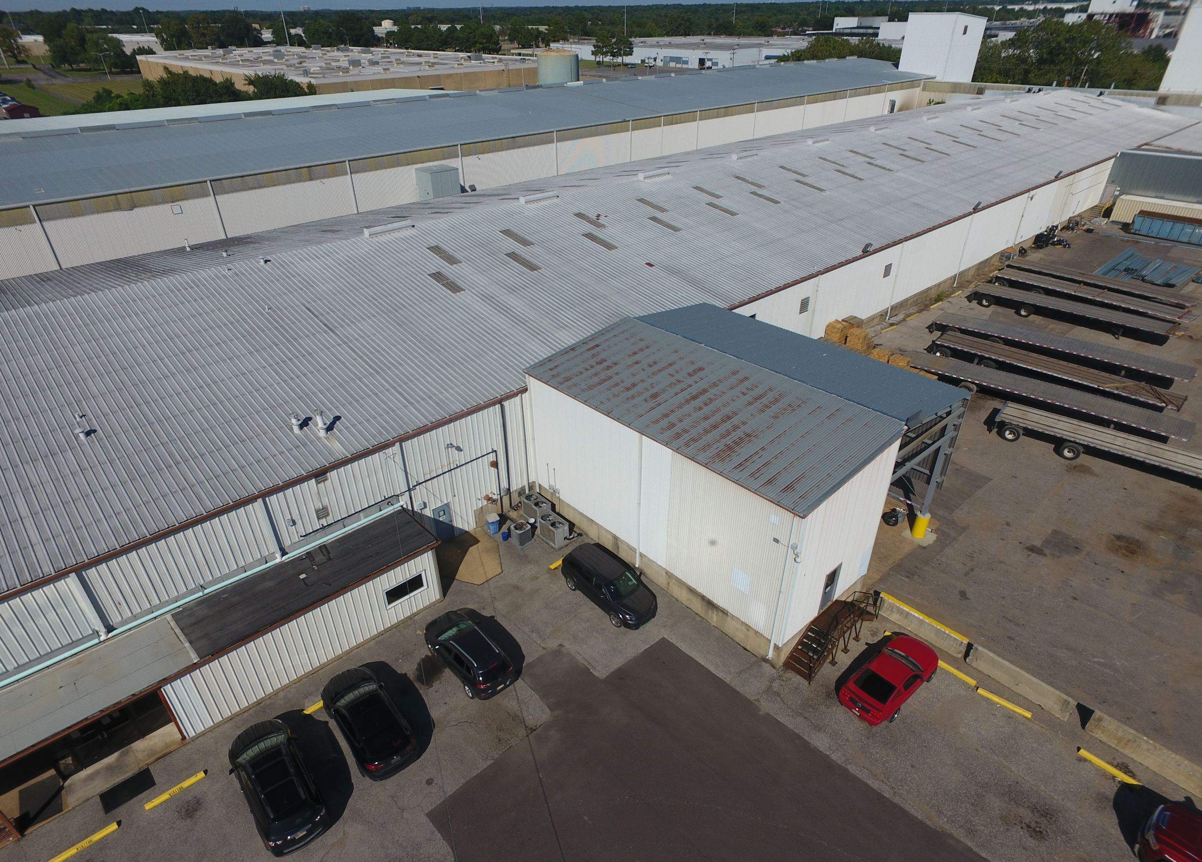 Commercial Metal Restoration System using Aldocoat Coatings by Hostetler Roofing