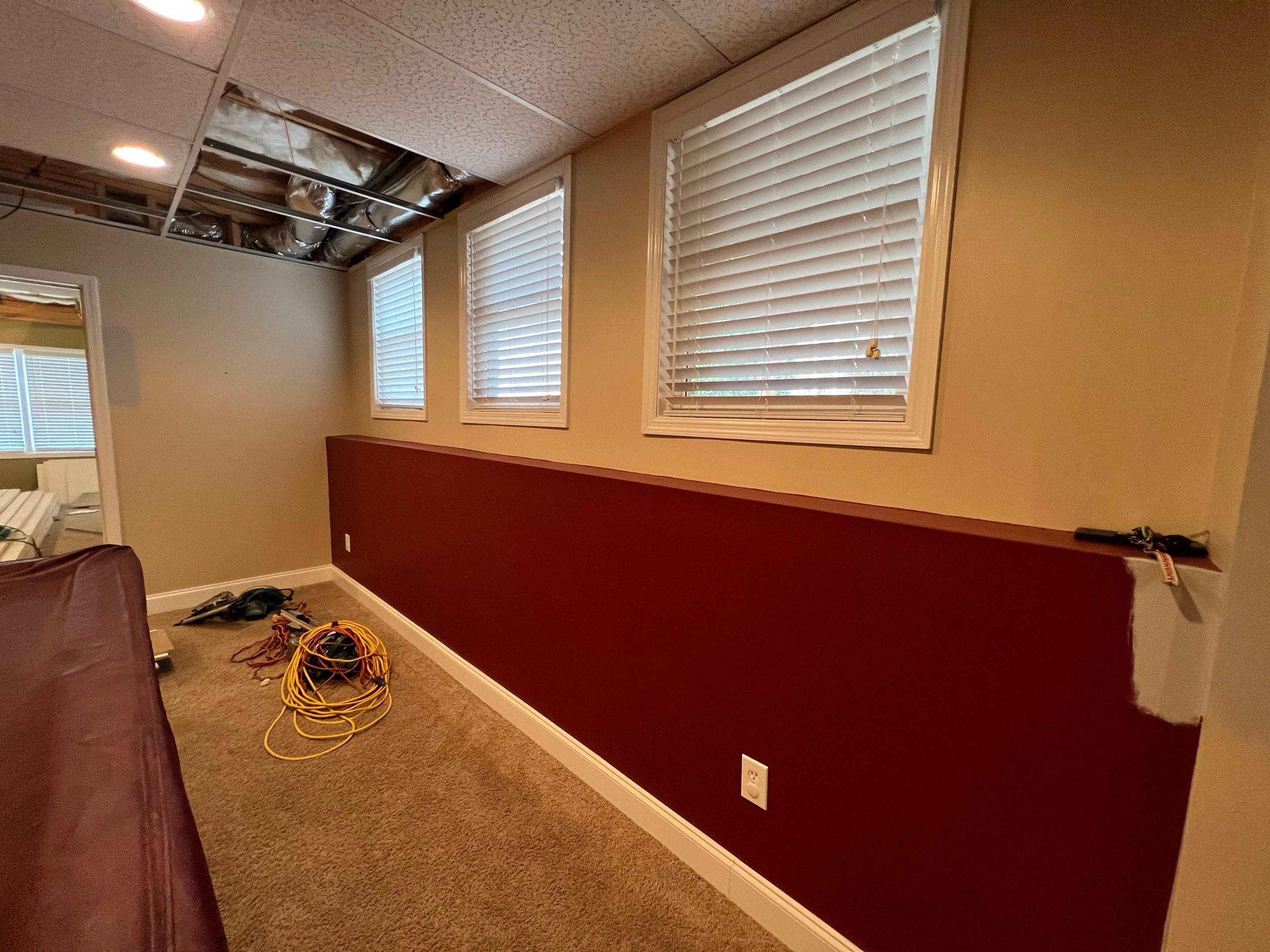 Modern Basement Remodeling in Woodstock with Custom Live-Edge Bar by Swift Home Renovations