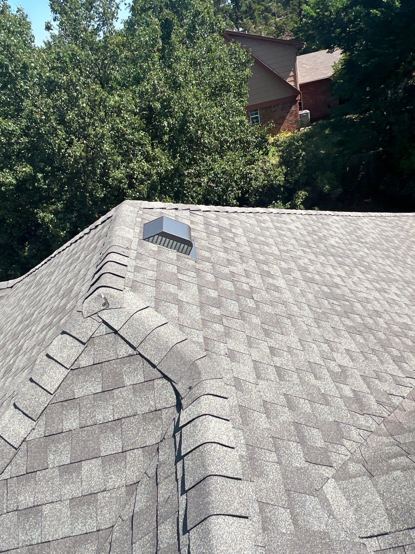 Roof Replacement and Gutter Installation in Edmond, OK by McCann's Roofing and Construction