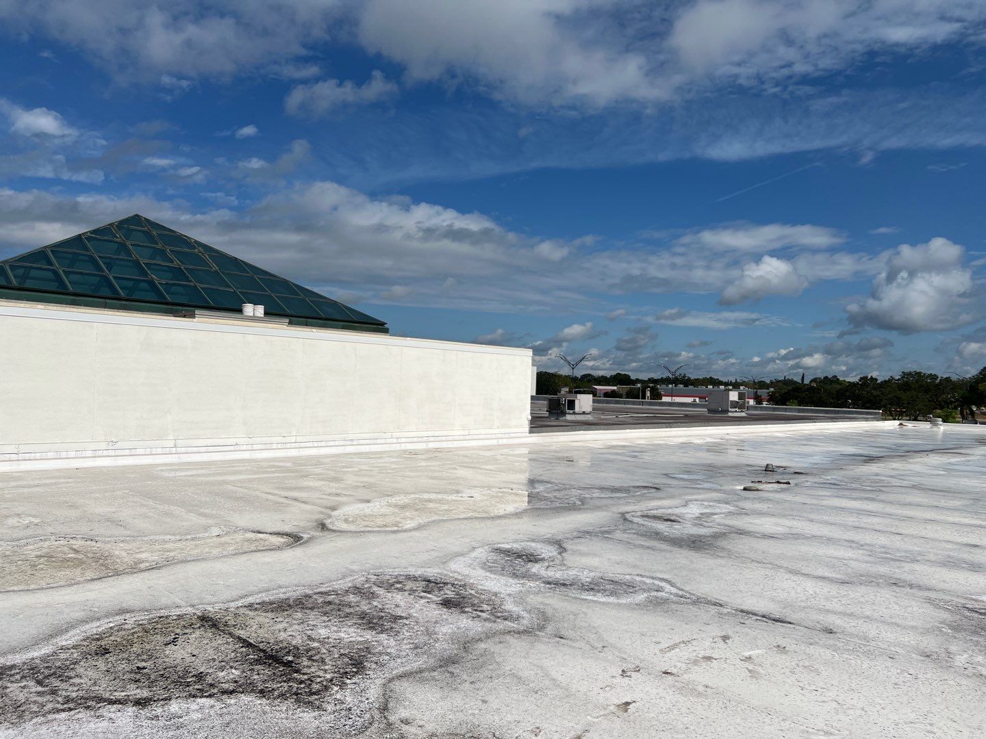 Silicone Roof Coating and Parapet Wall Repairs in South Bradenton by CES Roofing