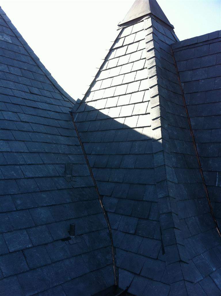 Historic Building ROOF REPLACEMNT with GAF TruSlate  on steep slop and Versico 60mil TPO on flat roof by Gorilla Exteriors Contracting, LLC