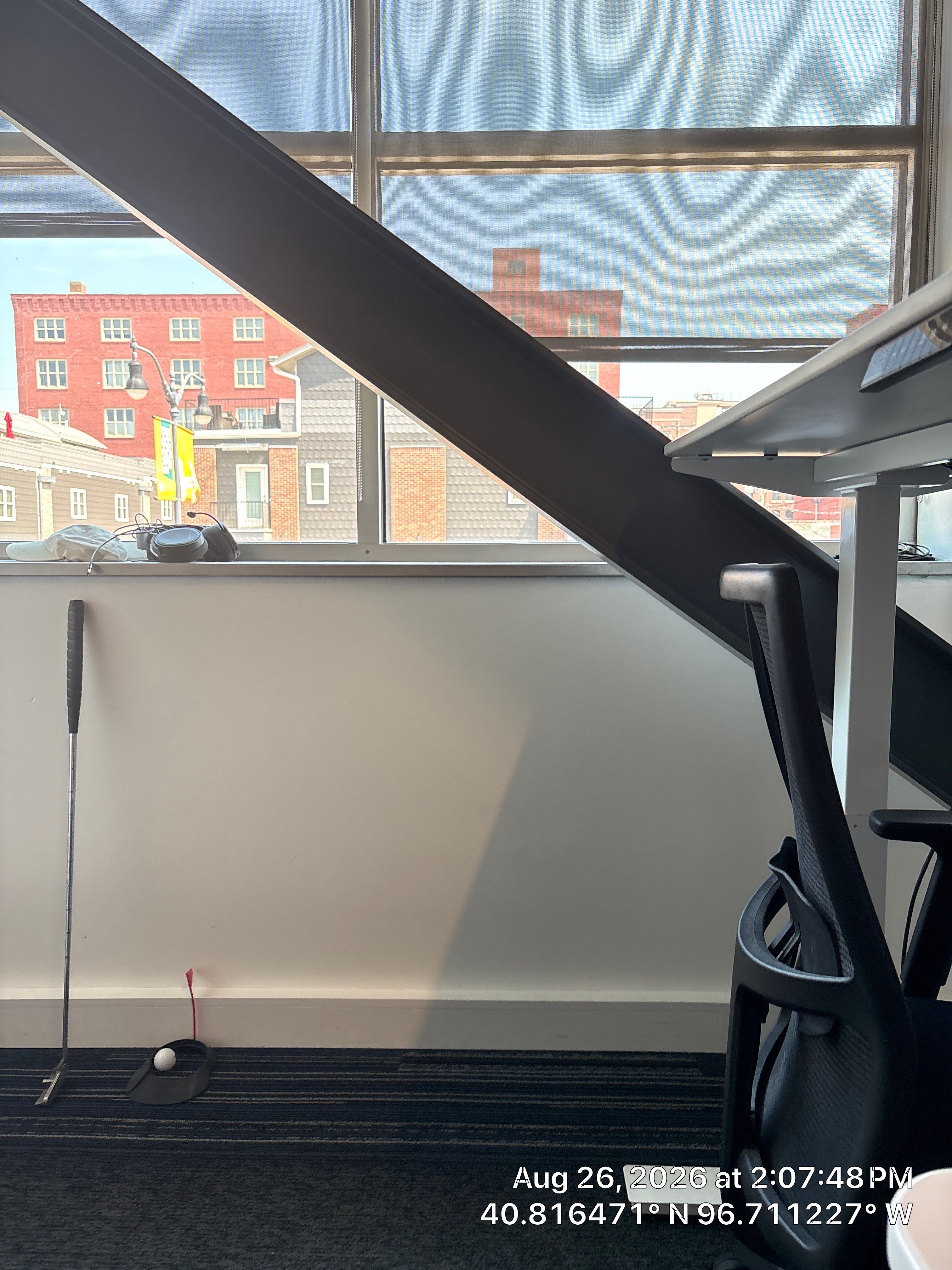 Modern Lincoln Office Setup with Integrated Indoor Putting Area by CompanyCam Sales Demo