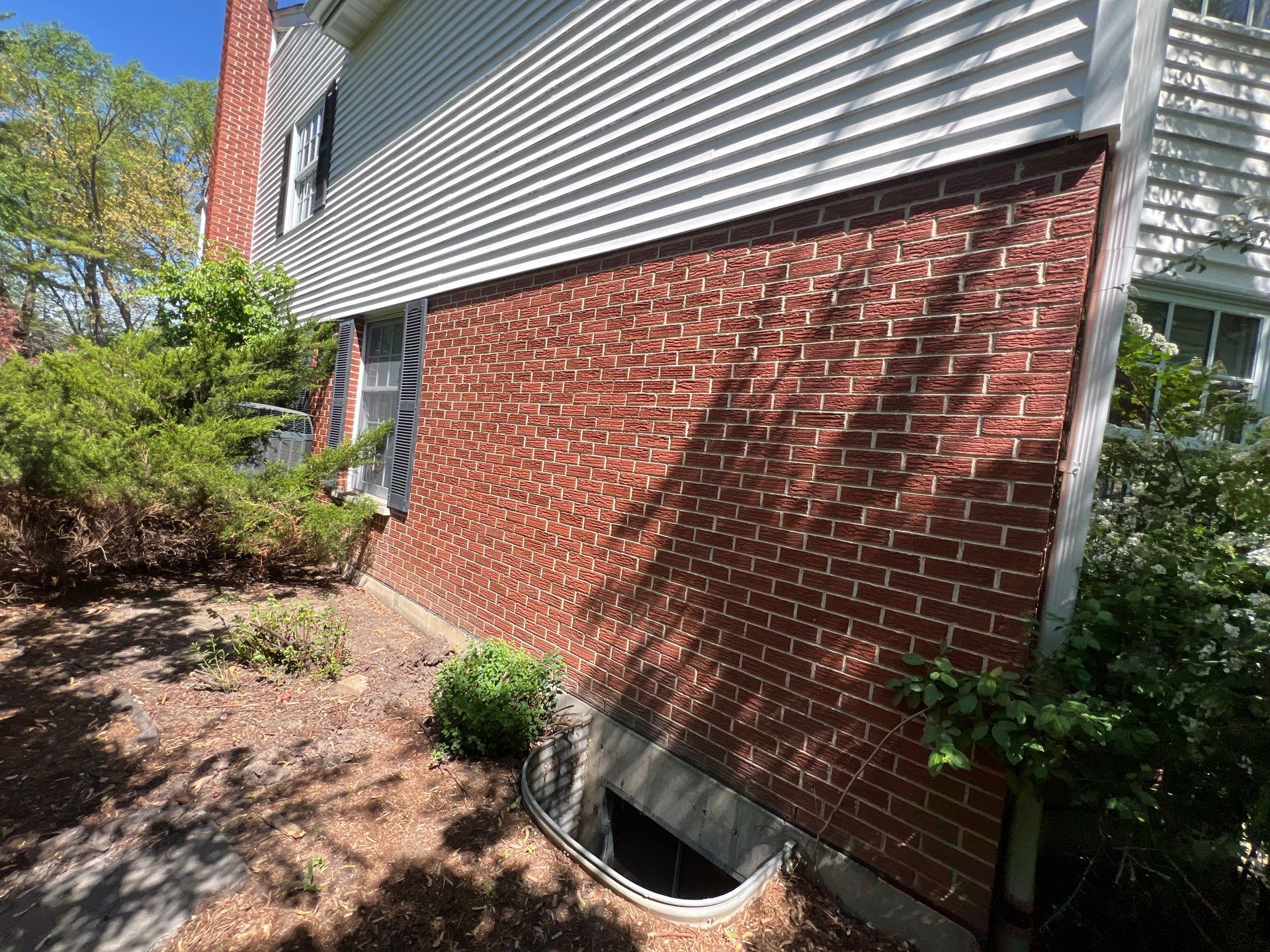 Housewashing  using Algaecide, soft wash soap by Northern Power Washing LLC.