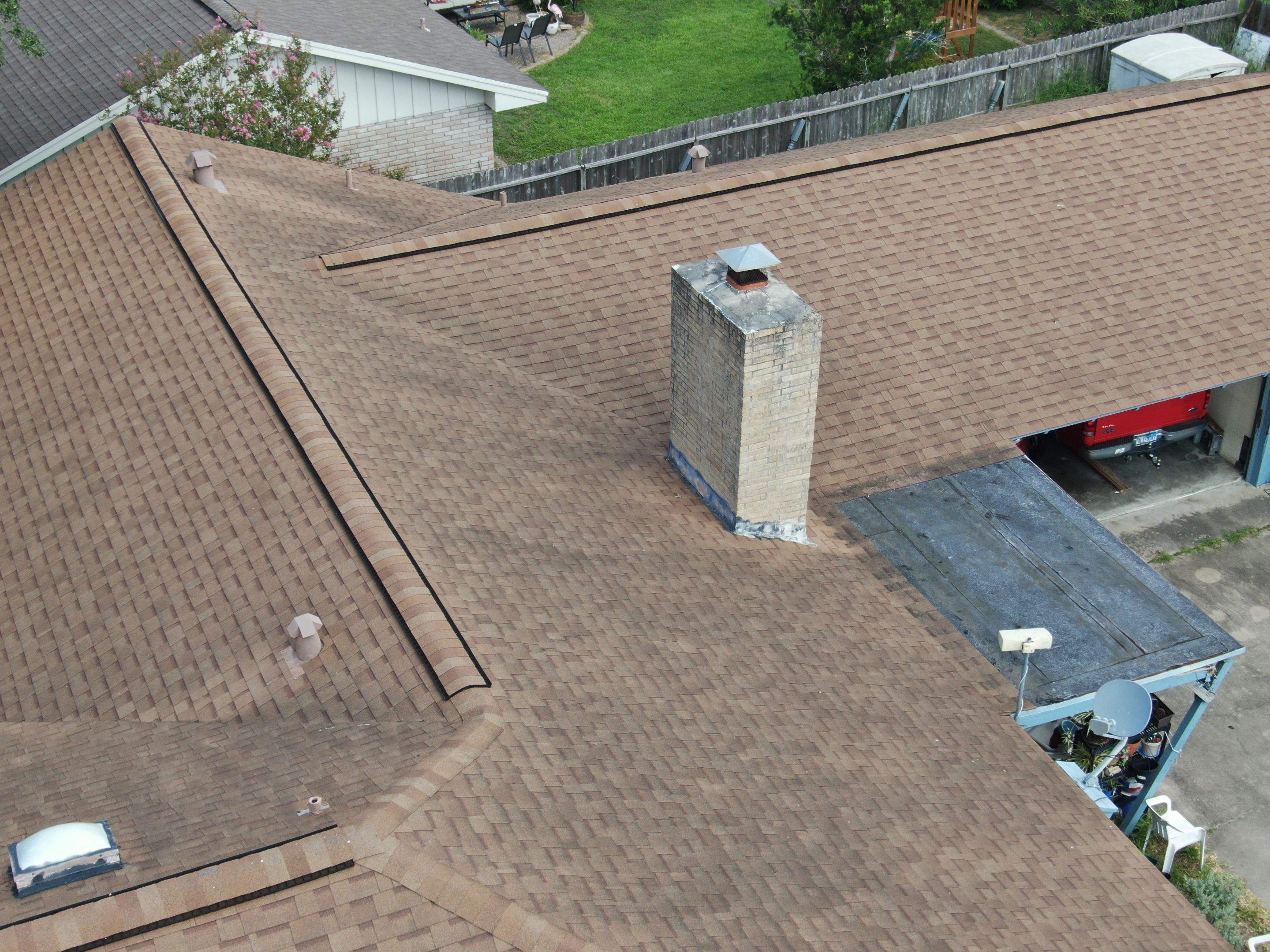 Chimneys need a Cricket.  by Bayfront Roofing and Construction