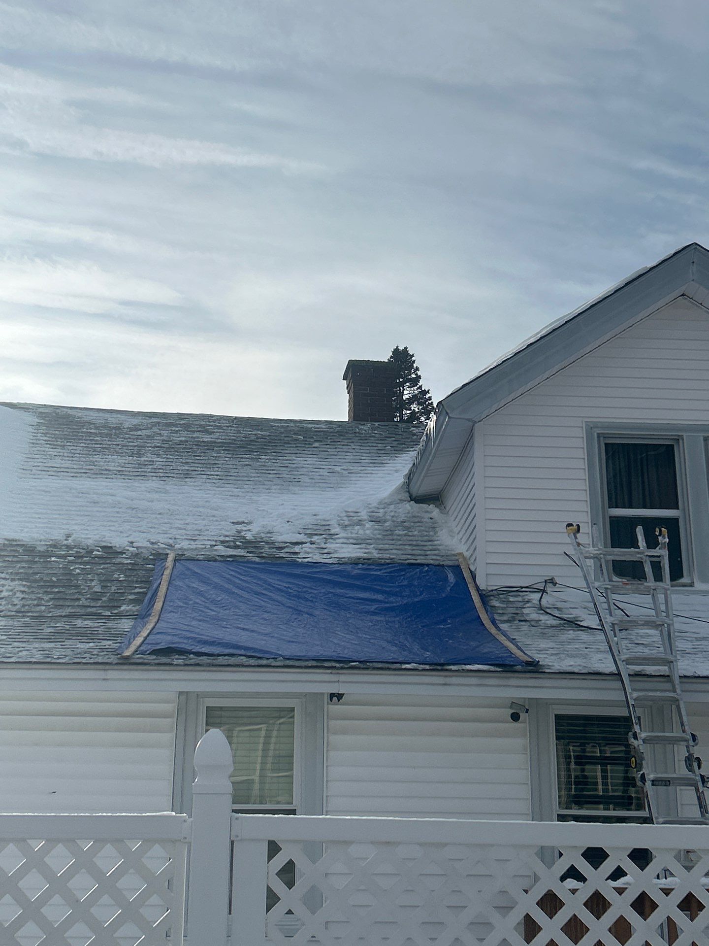 Emergency Snow Removal & Roof Tarp Installation in Lawrence, MA by Mighty Dog Roofing of Greater Middlesex County