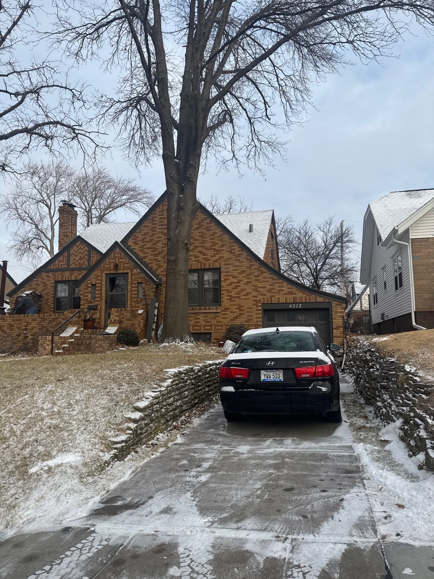 Dark Bronze Exterior Window Replacement Project in Omaha by Carps Complete Exteriors