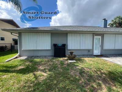 Accordion Shutters in White