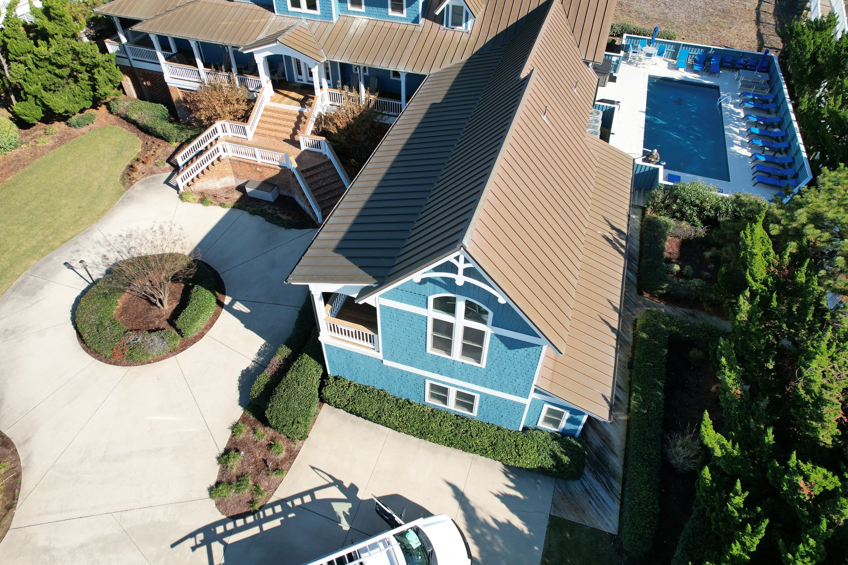 Large Metal Roof Transformation by Gallop Roofing & Remodeling, Inc.