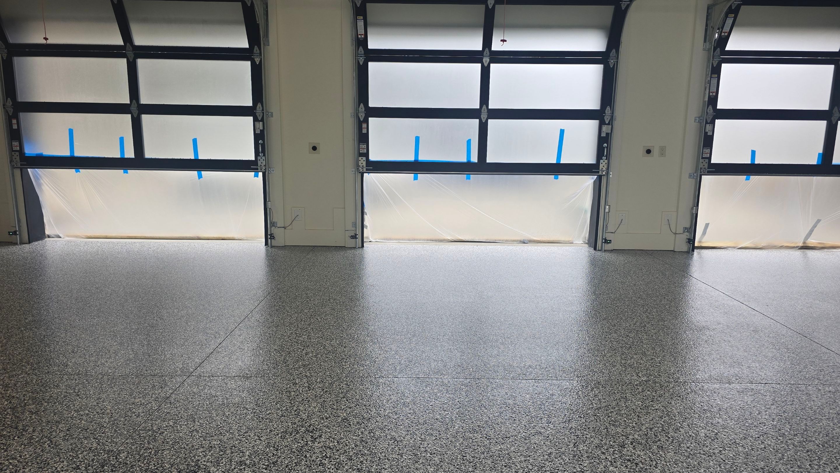 Garage using Domino by Elite Floor Solutions