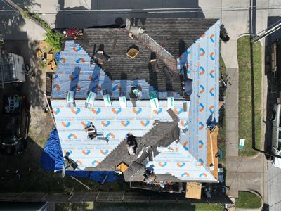 Residential Roofing Installation using Malarkey Highlander Natural Wood