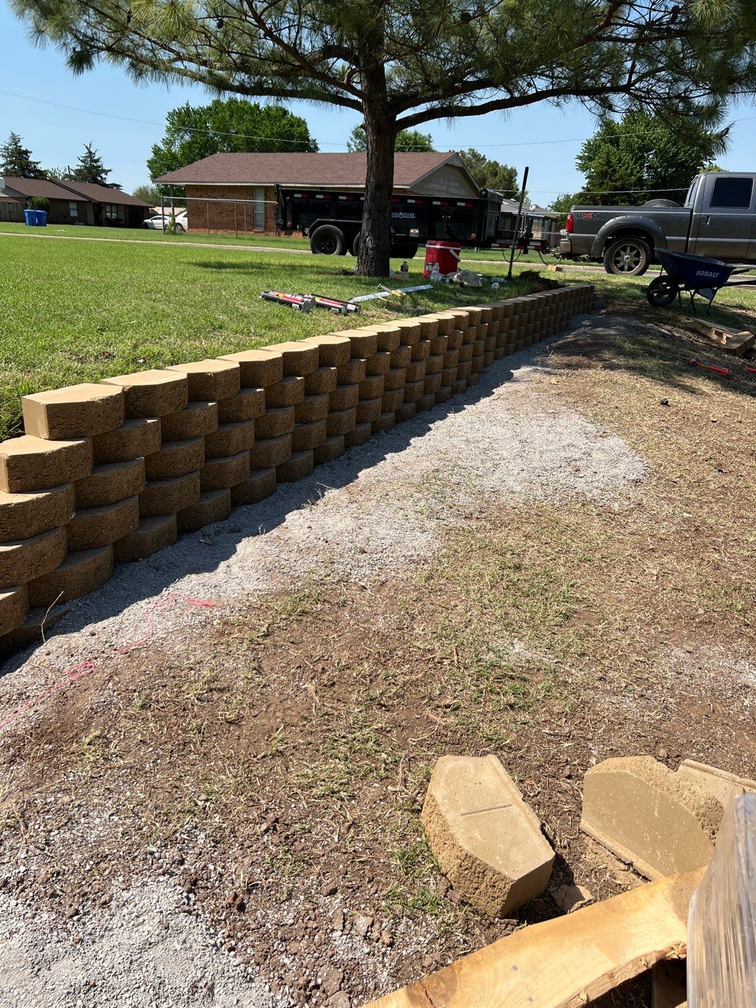 Retaining Wall using Rocks by Clays Services Inc