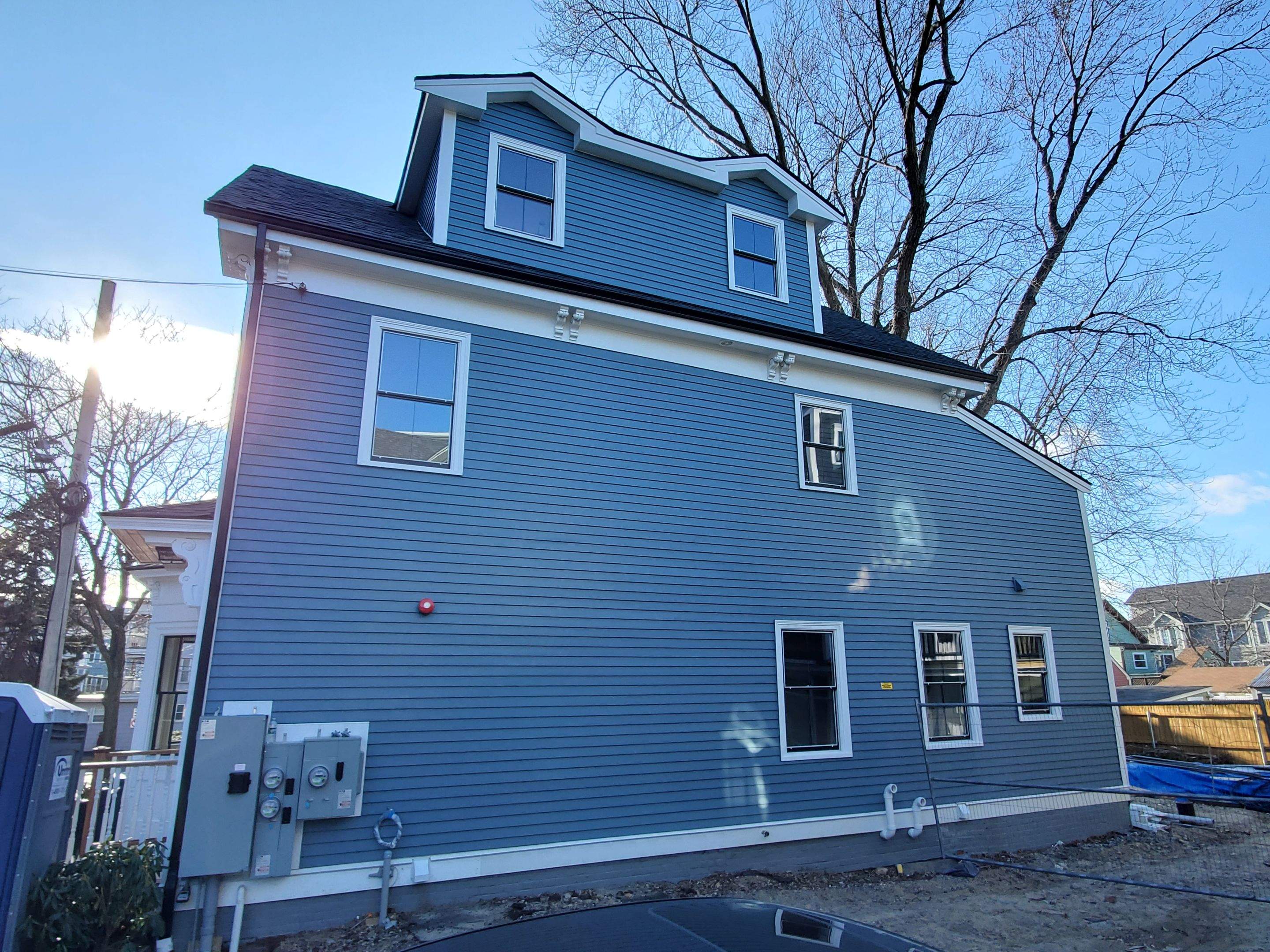 Siding Installation using Wood Clapboards by UBrothers Construction