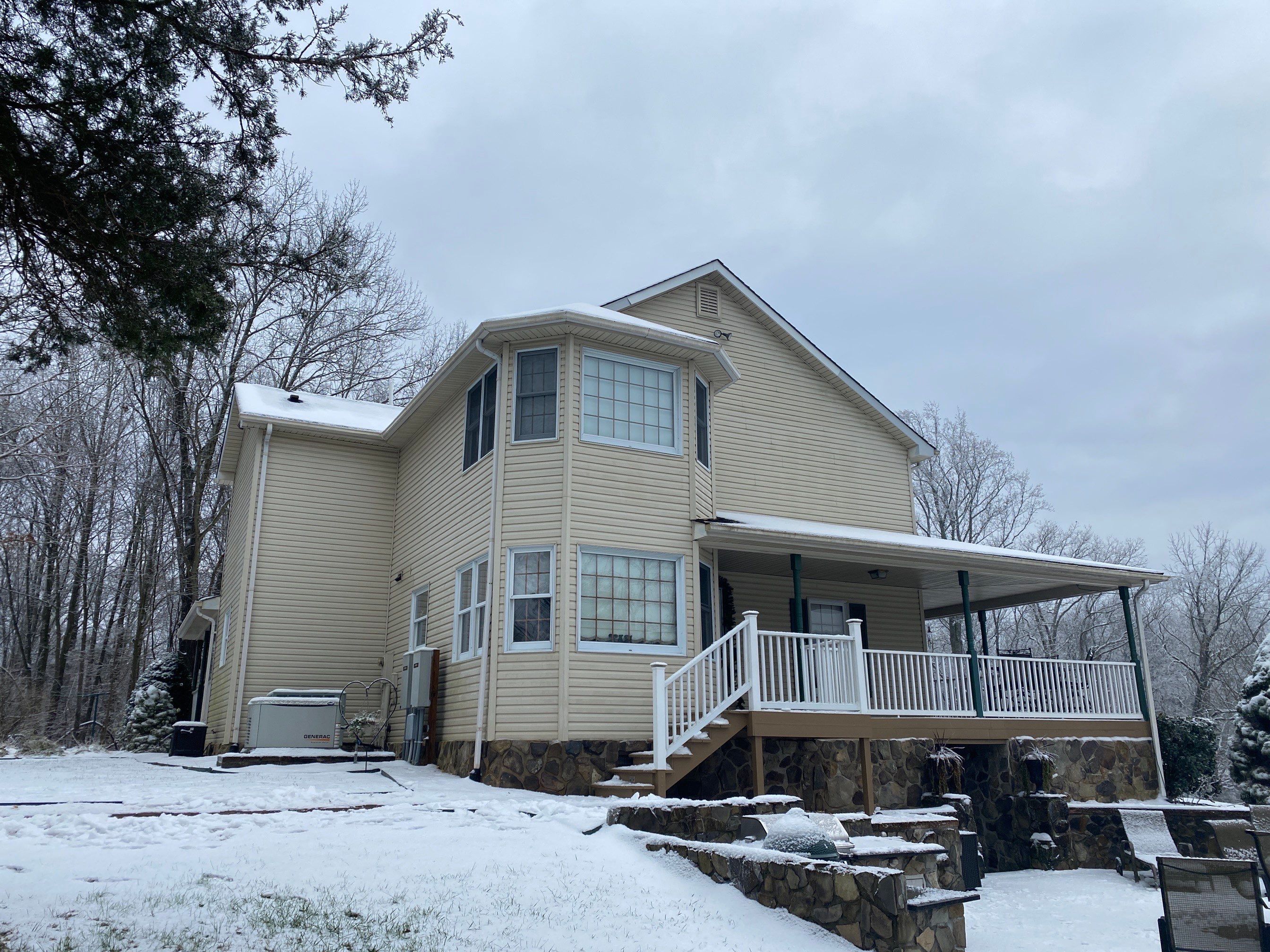 Exterior remodel including window replacement by American Home Contractors