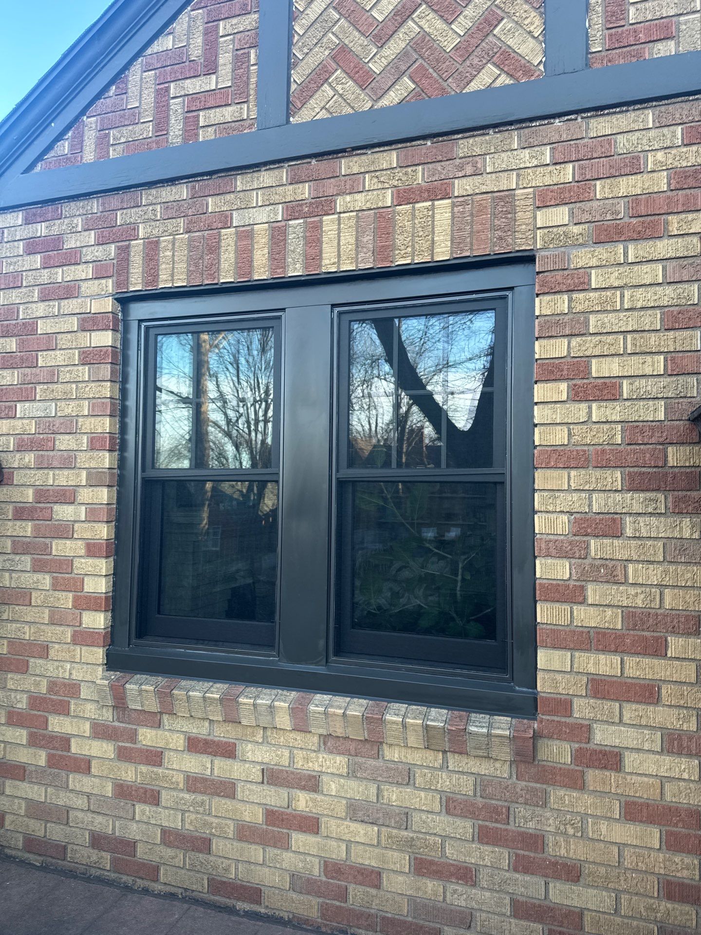 Dark Bronze Exterior Window Replacement Project in Omaha by Carps Complete Exteriors