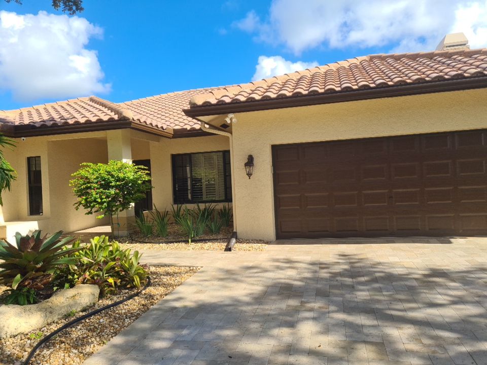Residential Roofing Installation using 1" Nail strip metal roof by BLUES BROTHERS CONSTRUCTION CORP