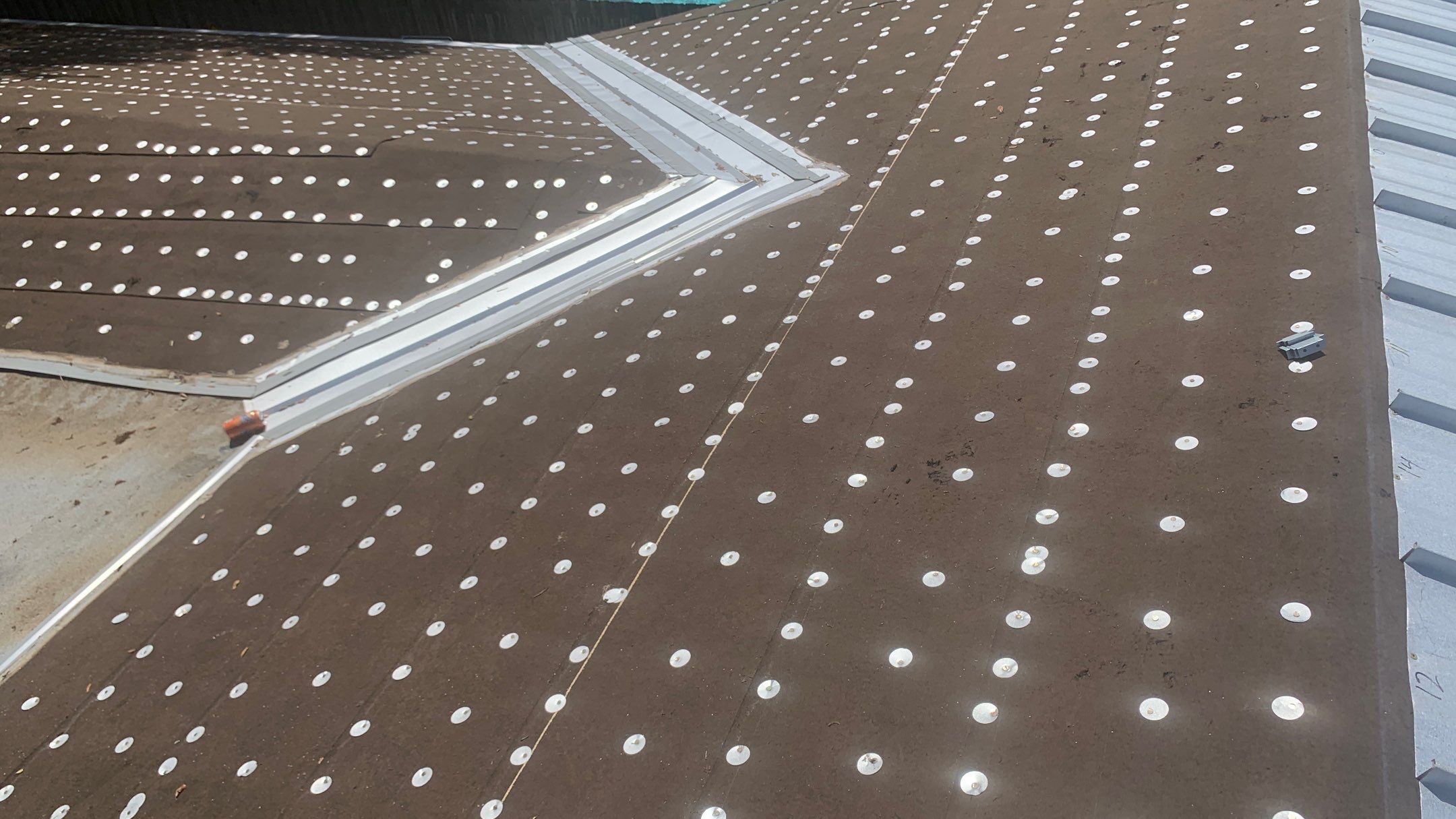 Residential Roofing Installation using 1.5'' Mechanical Seam by BLUES BROTHERS ROOFING