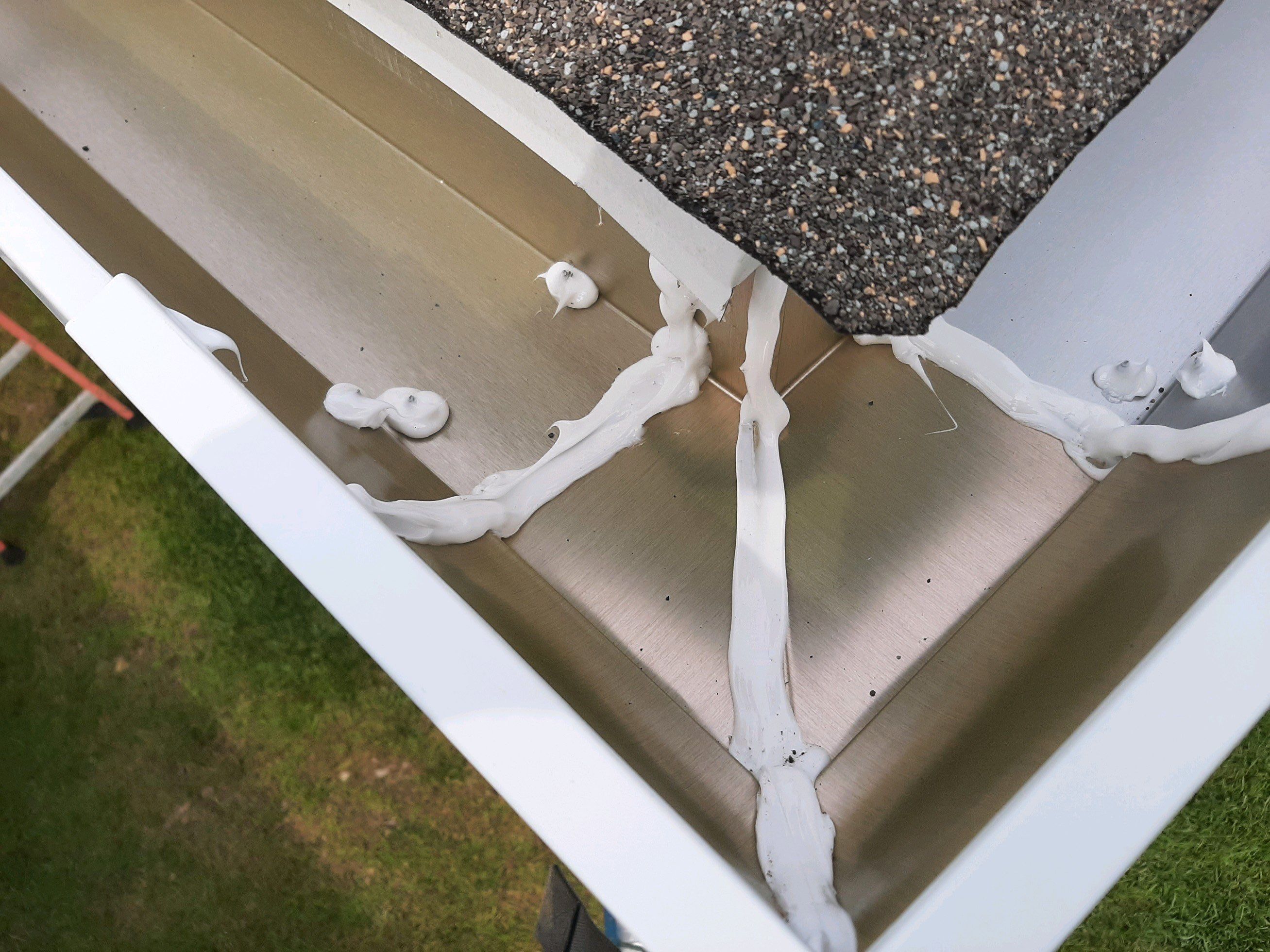 Seamless Gutter Installation using White K-Style Gutters by Gutter Professors