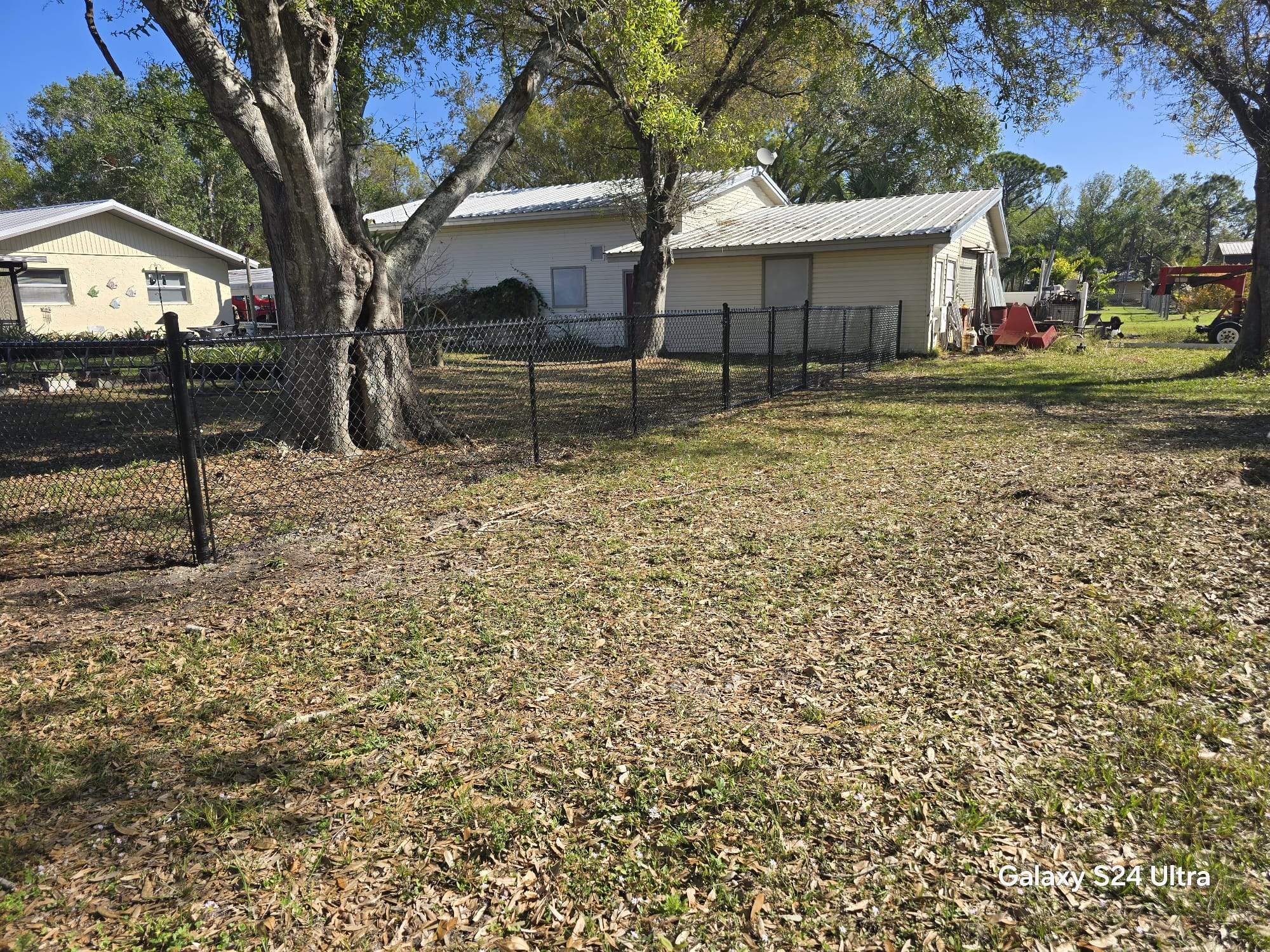 Black Chain Link Fence Installation in Port Charlotte by True Fence LLC