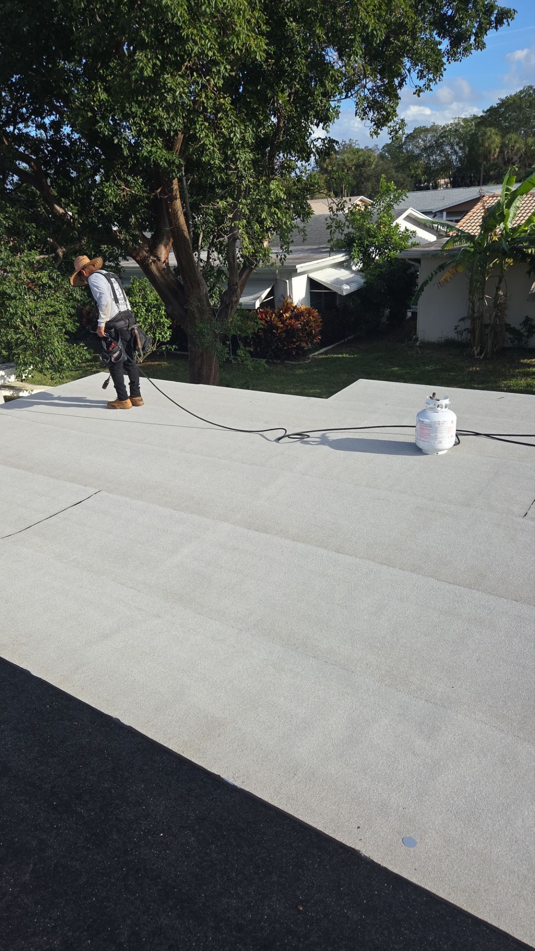 Silicone install-- Flat roof by Aastro Roofing